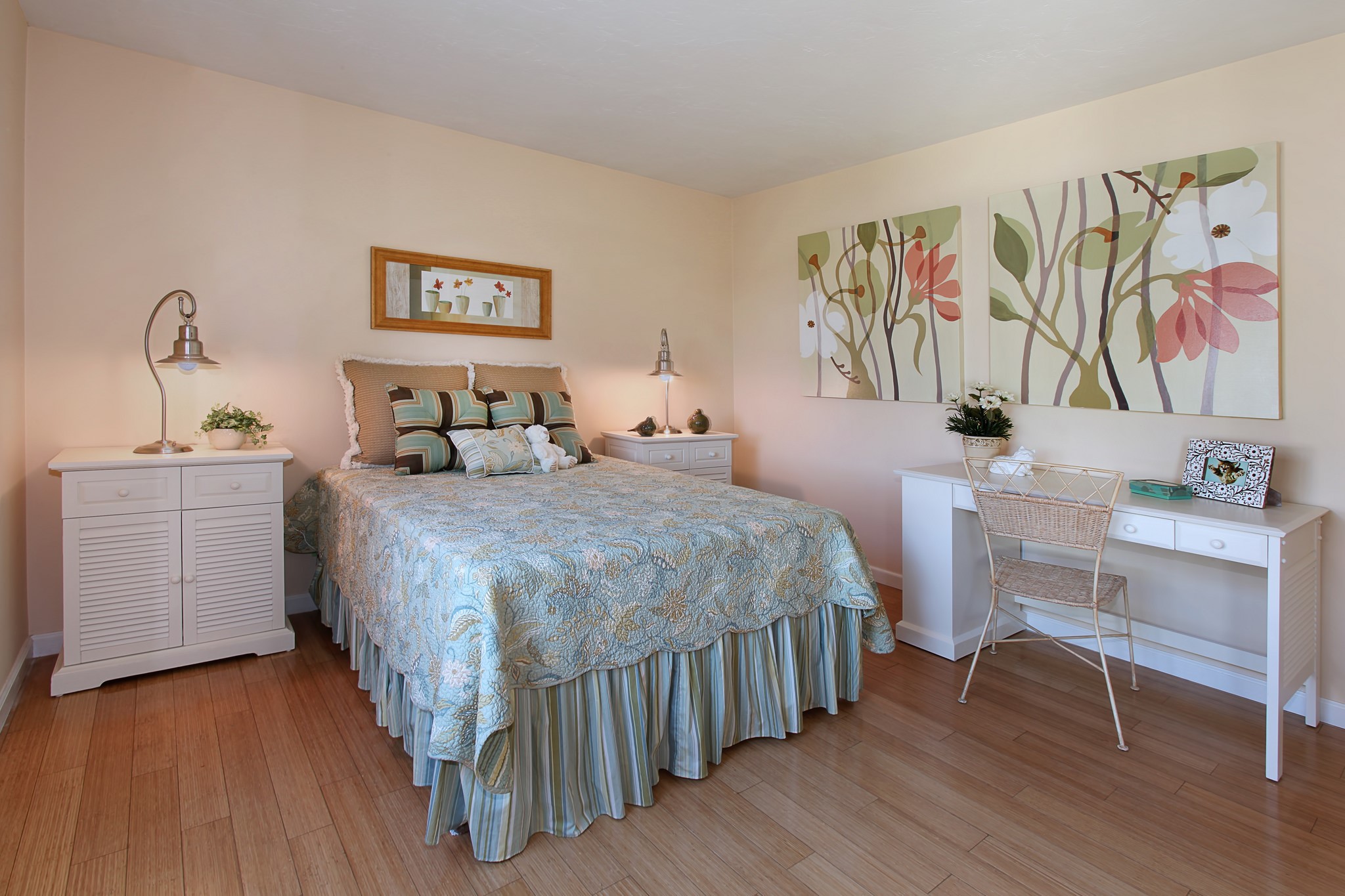 Bedroom with bed, desk, and artwork HD Wallpaper