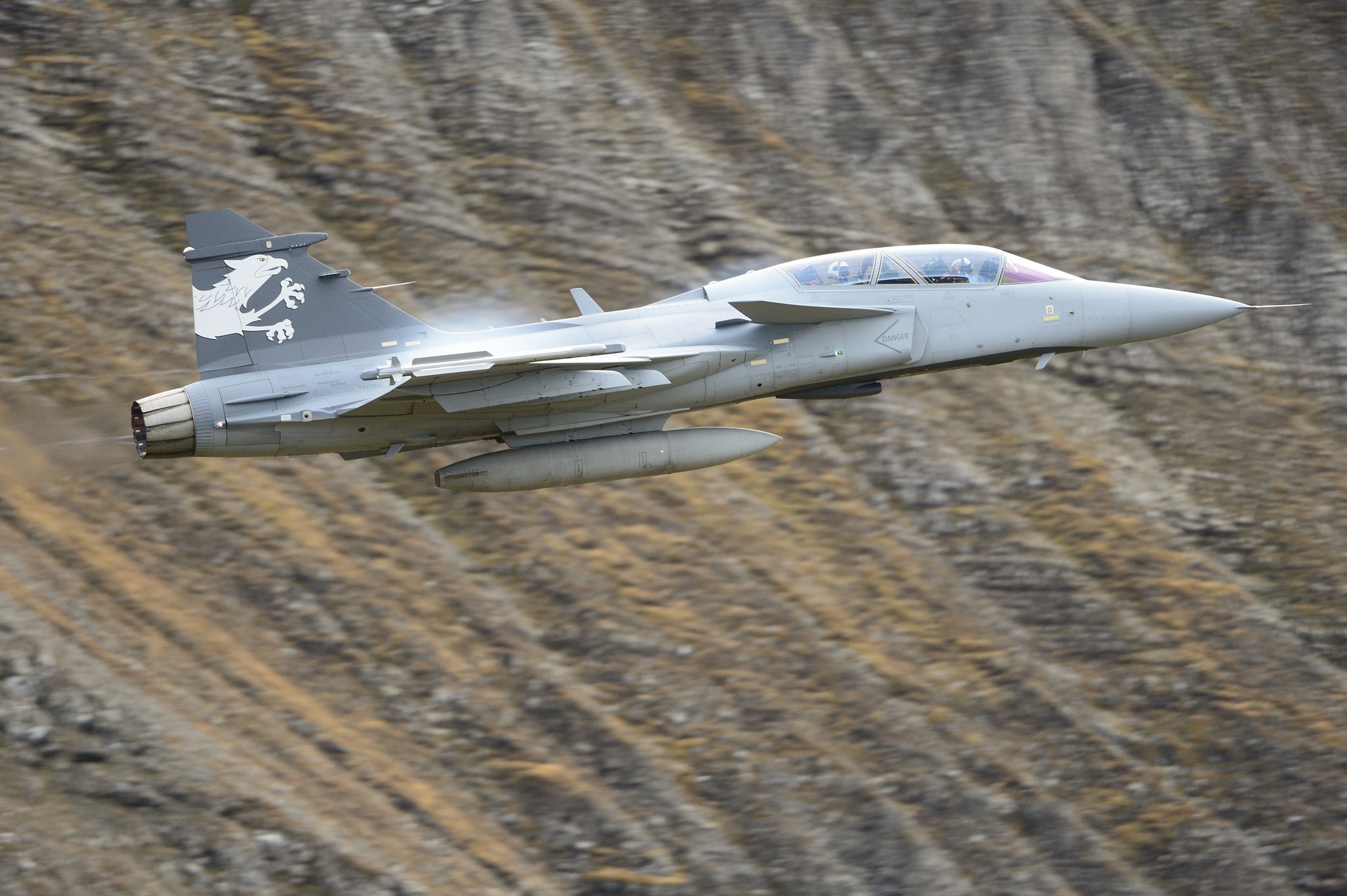 Saab JAS 39 Gripen fighter jet flying near mountains HD Wallpaper