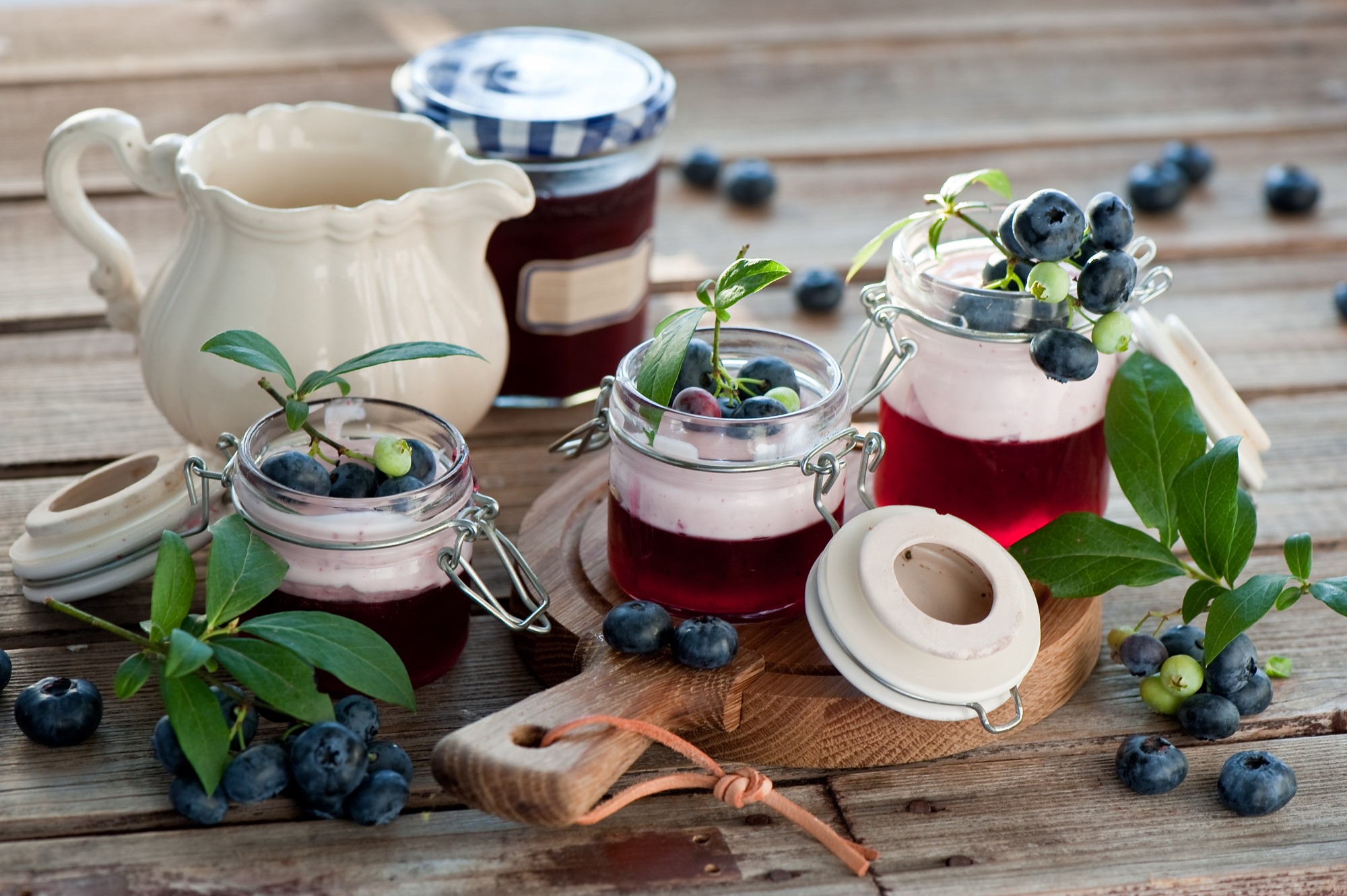 Blueberry desserts in jars with a pitcher and jam jar HD Wallpaper