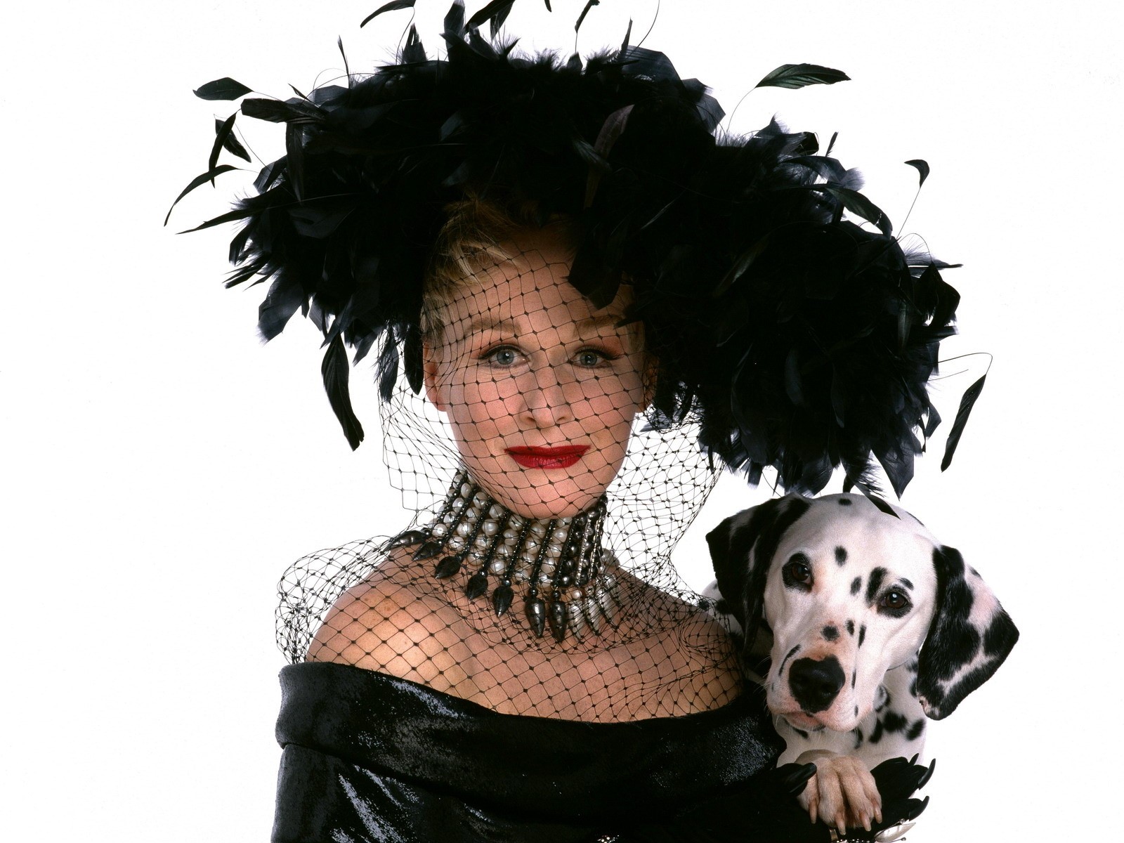 Cruella de Vil with a Dalmatian dog HD Wallpaper