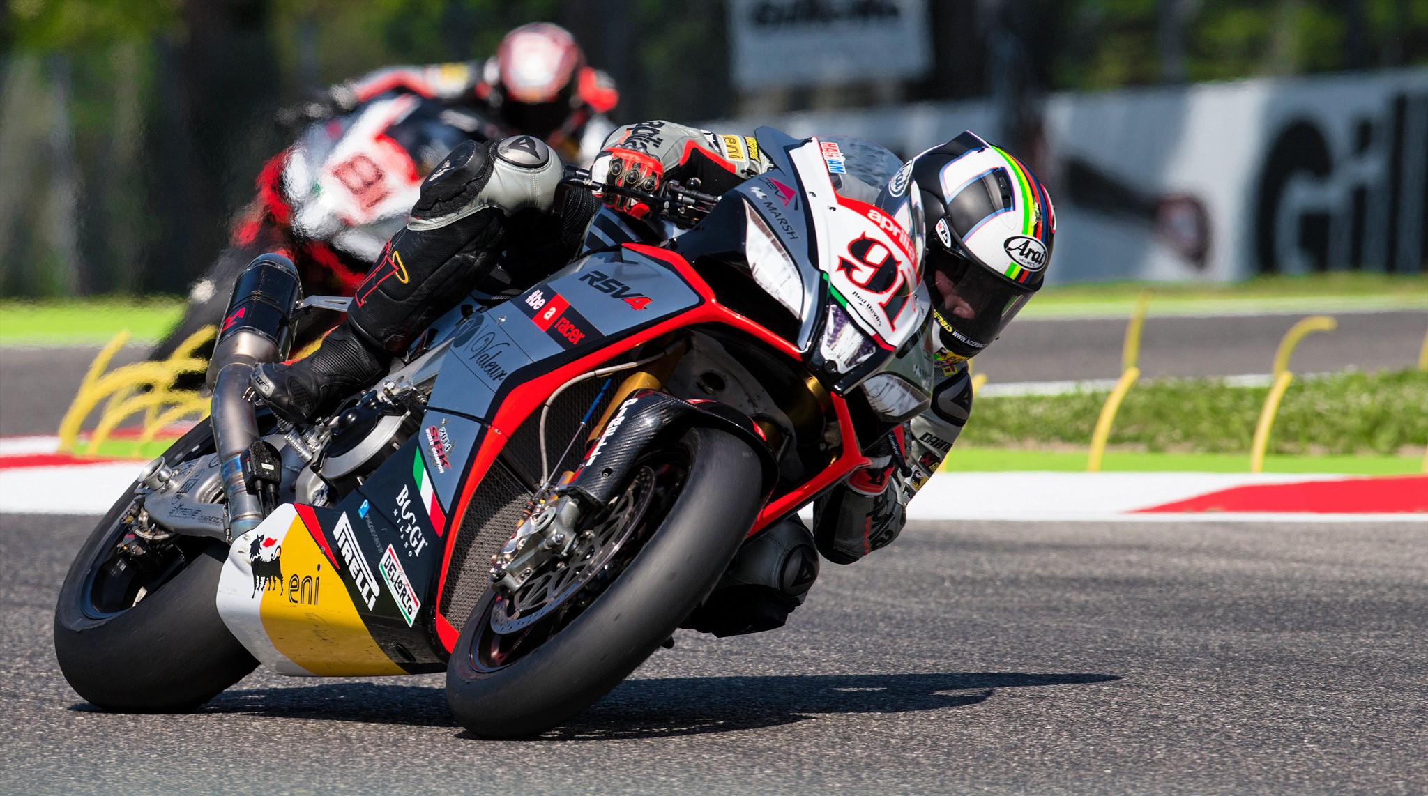 Motorcyclist on Aprilia RSV4 at a Race HD Wallpaper