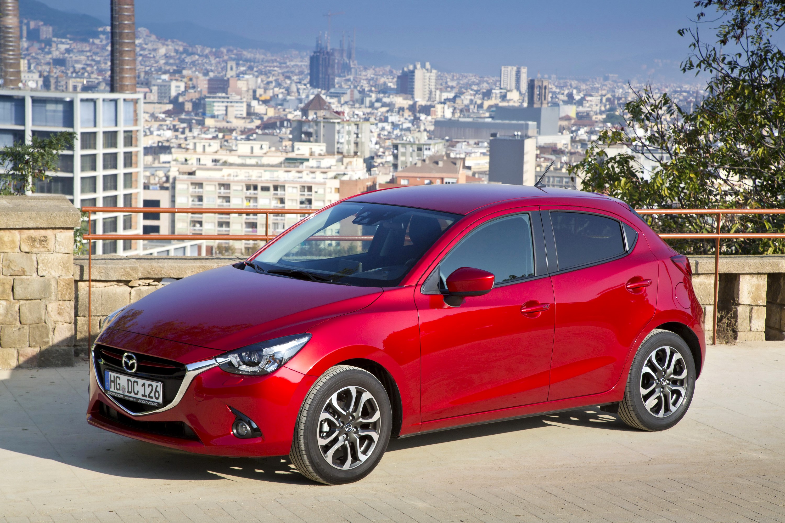 Red Mazda 2 Hatchback in Barcelona HD Wallpaper