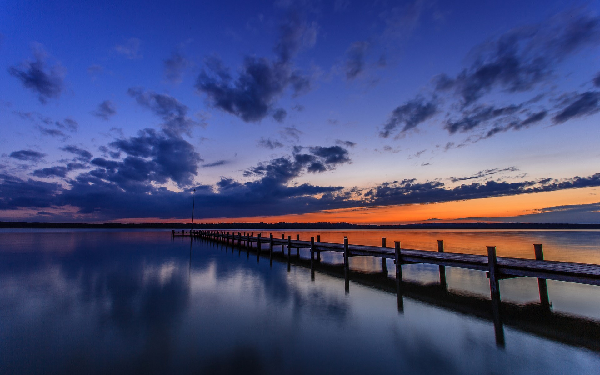 Wooden pier on a lake at sunset HD Wallpaper