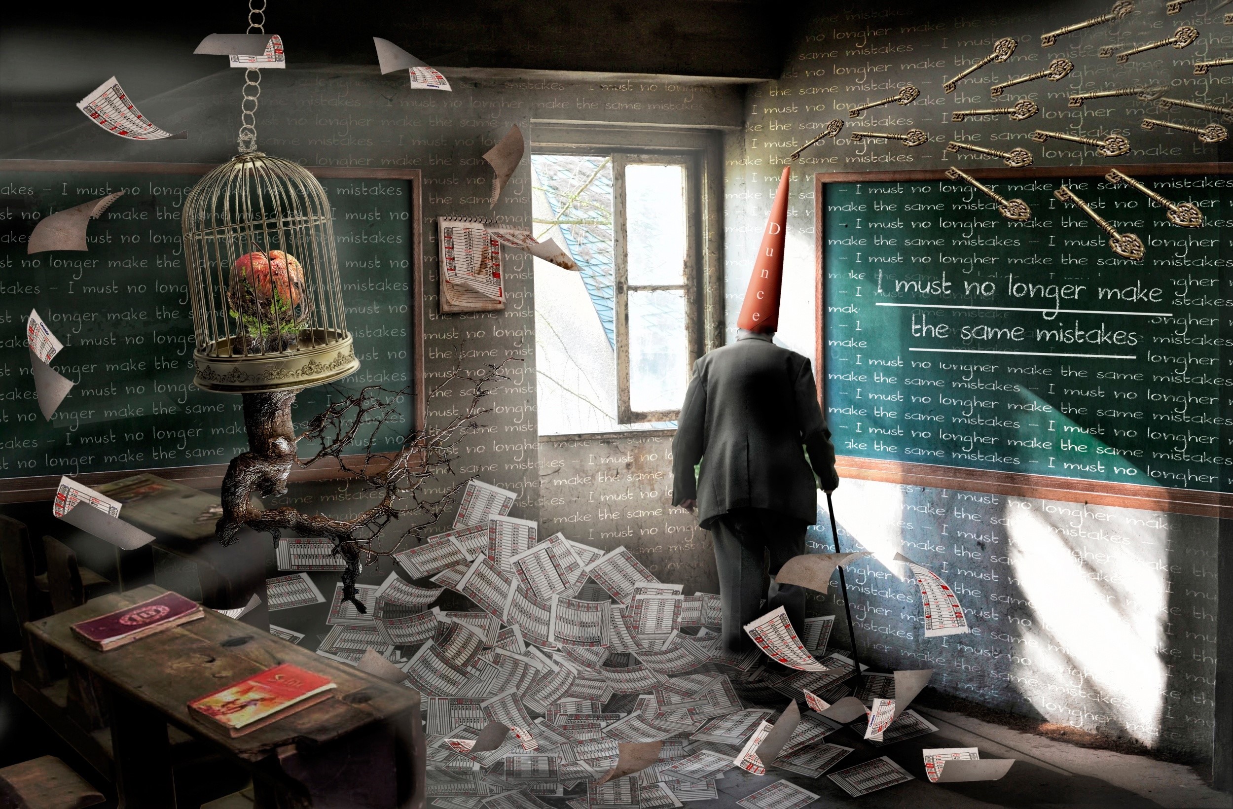 Man in dunce cap in classroom with papers HD Wallpaper