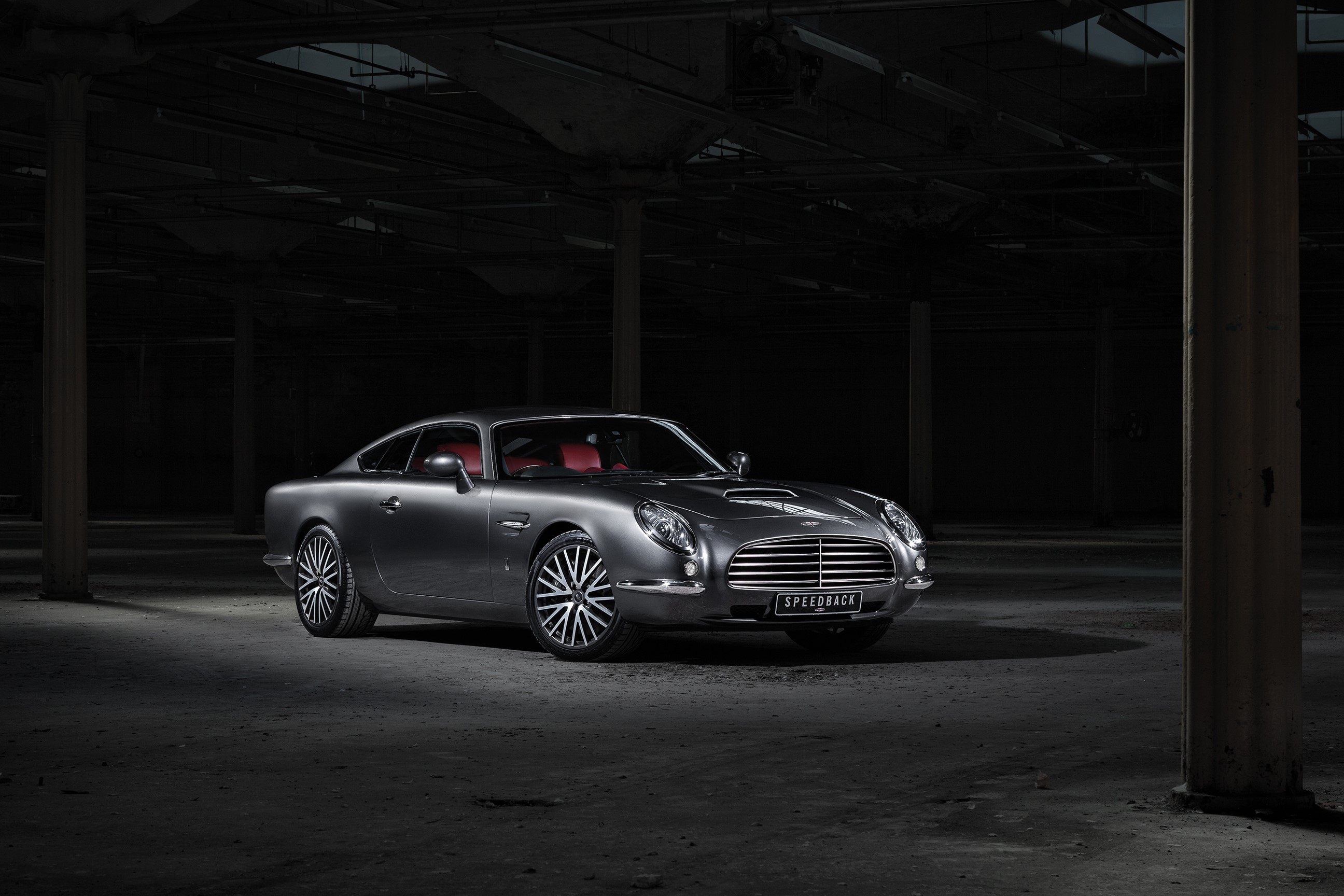 David Brown Automotive Speedback GT in a dark warehouse HD Wallpaper