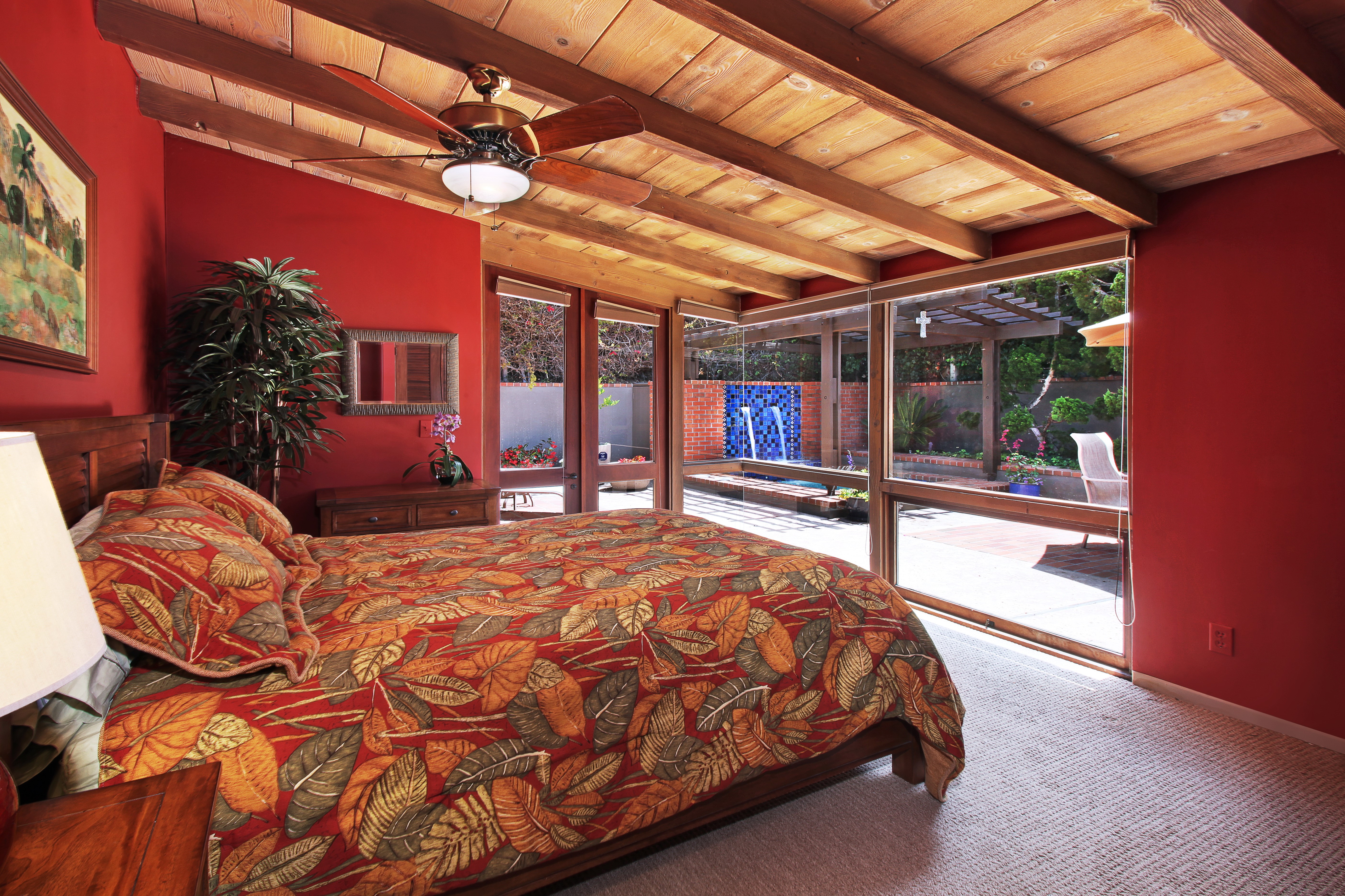 Bedroom with red walls and wooden ceiling HD Wallpaper