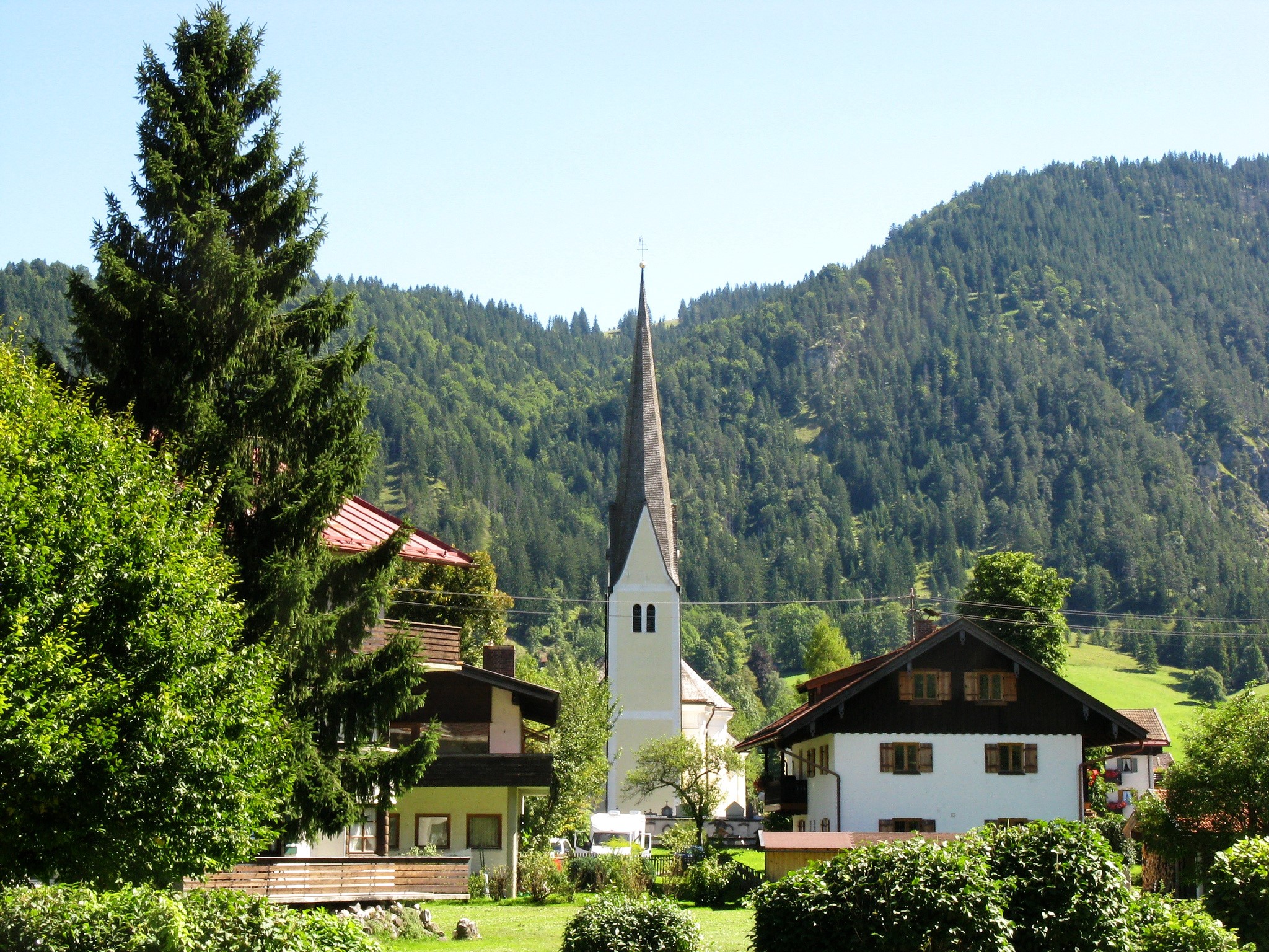 Village with church and mountains in Bavaria, Germany HD Wallpaper