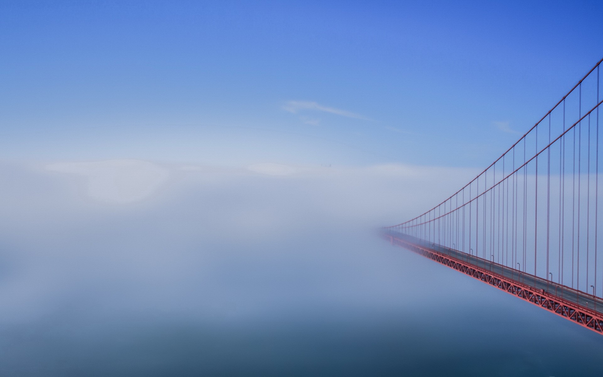 Golden Gate Bridge shrouded in fog HD Wallpaper