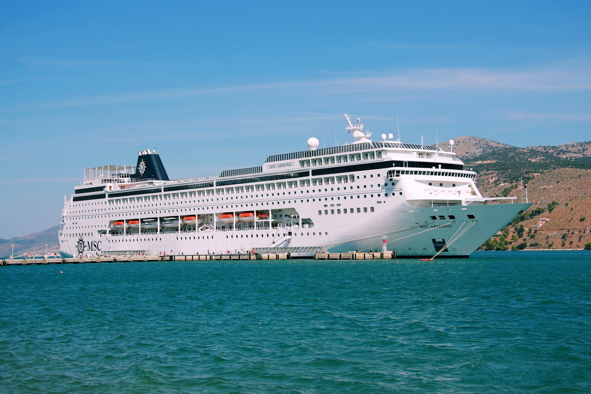 MSC Armonia cruise liner docked at a pier HD Wallpaper