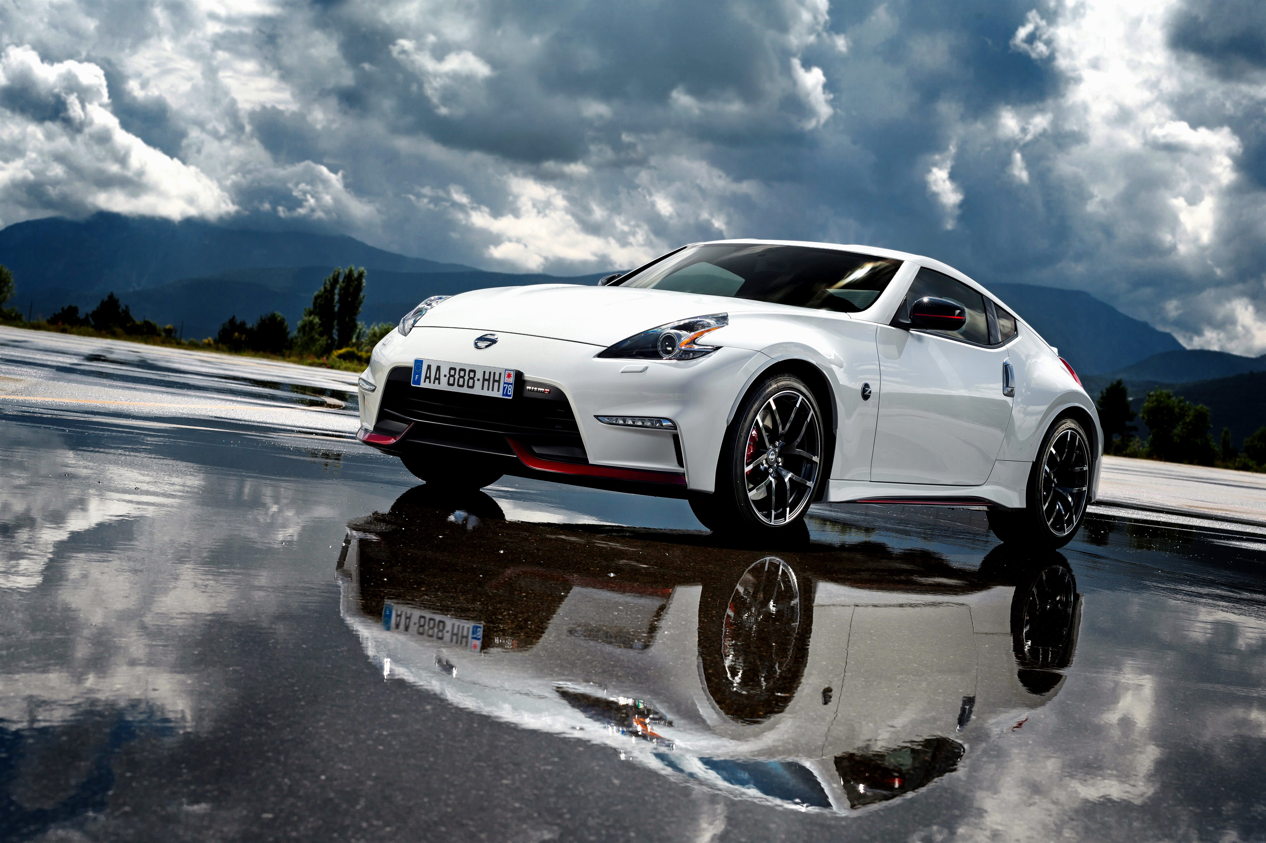 White Nissan 370Z Nismo on wet road HD Wallpaper
