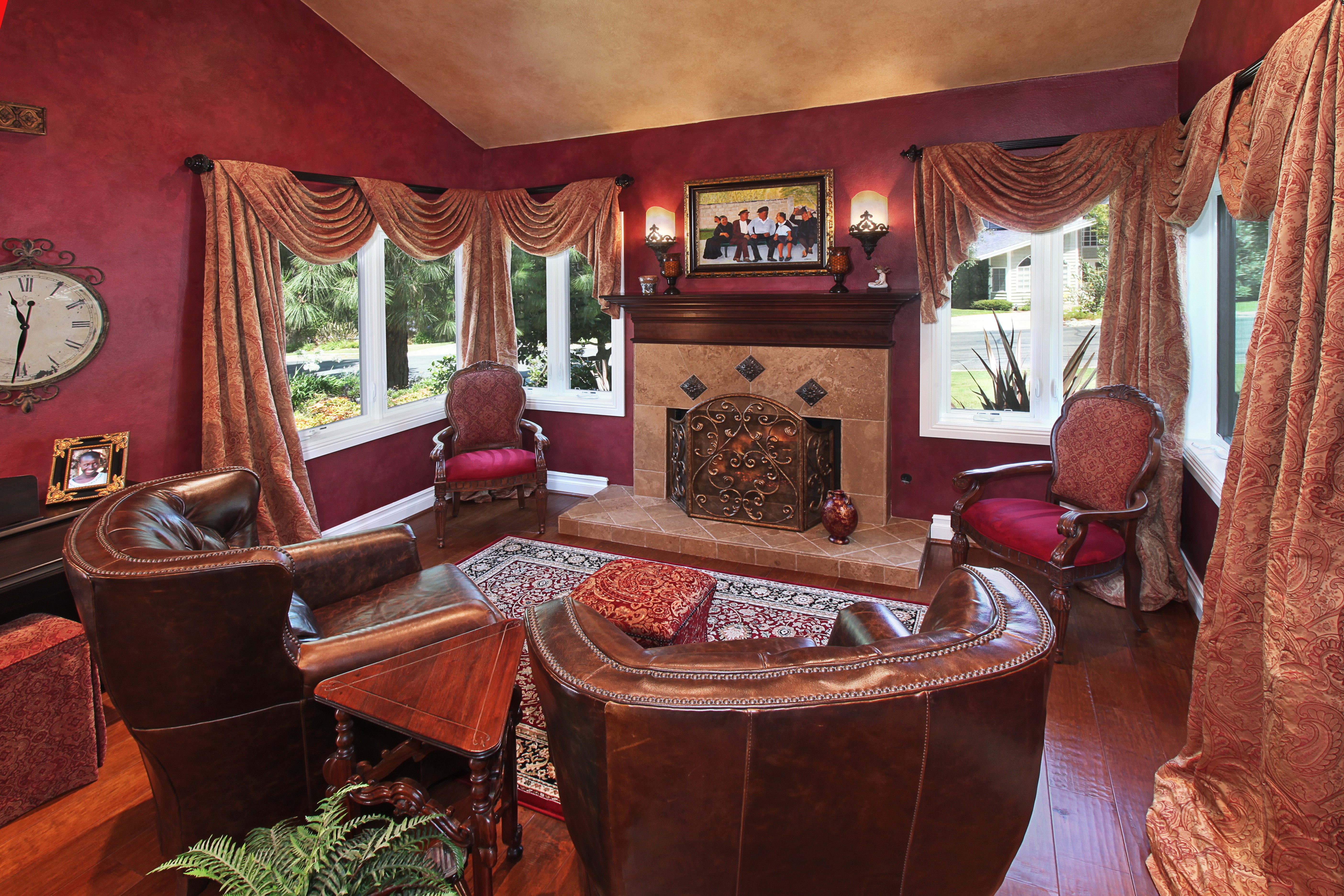 Living room with fireplace and armchairs HD Wallpaper