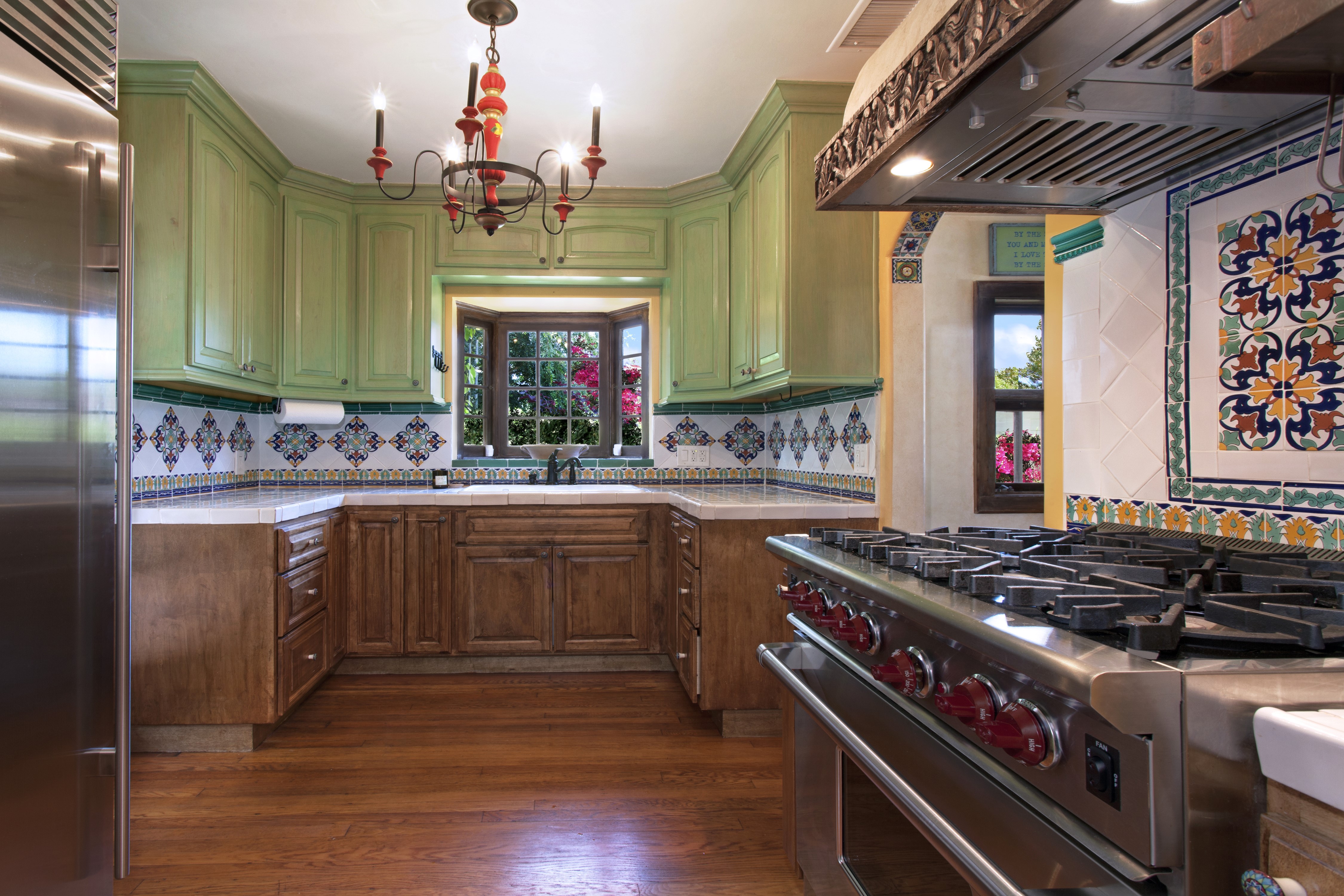 Kitchen with Chandelier and Stainless Steel Appliances HD Wallpaper