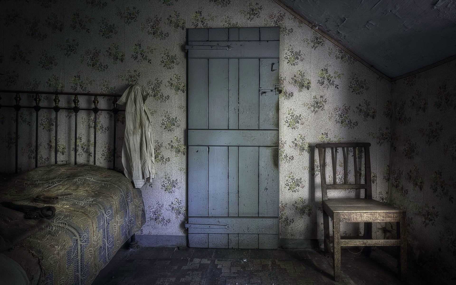 Abandoned room with bed, door, and chair HD Wallpaper