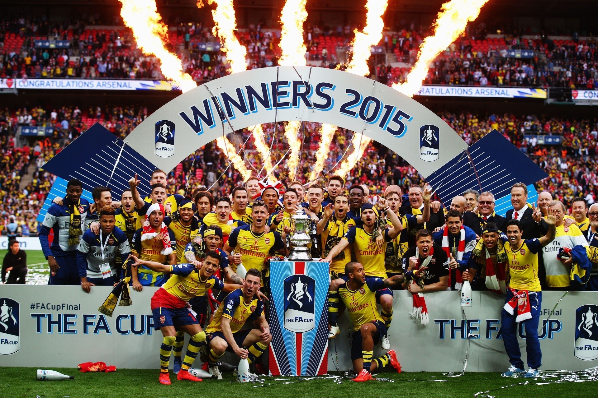Arsenal football team celebrating FA Cup win in 2015 HD Wallpaper