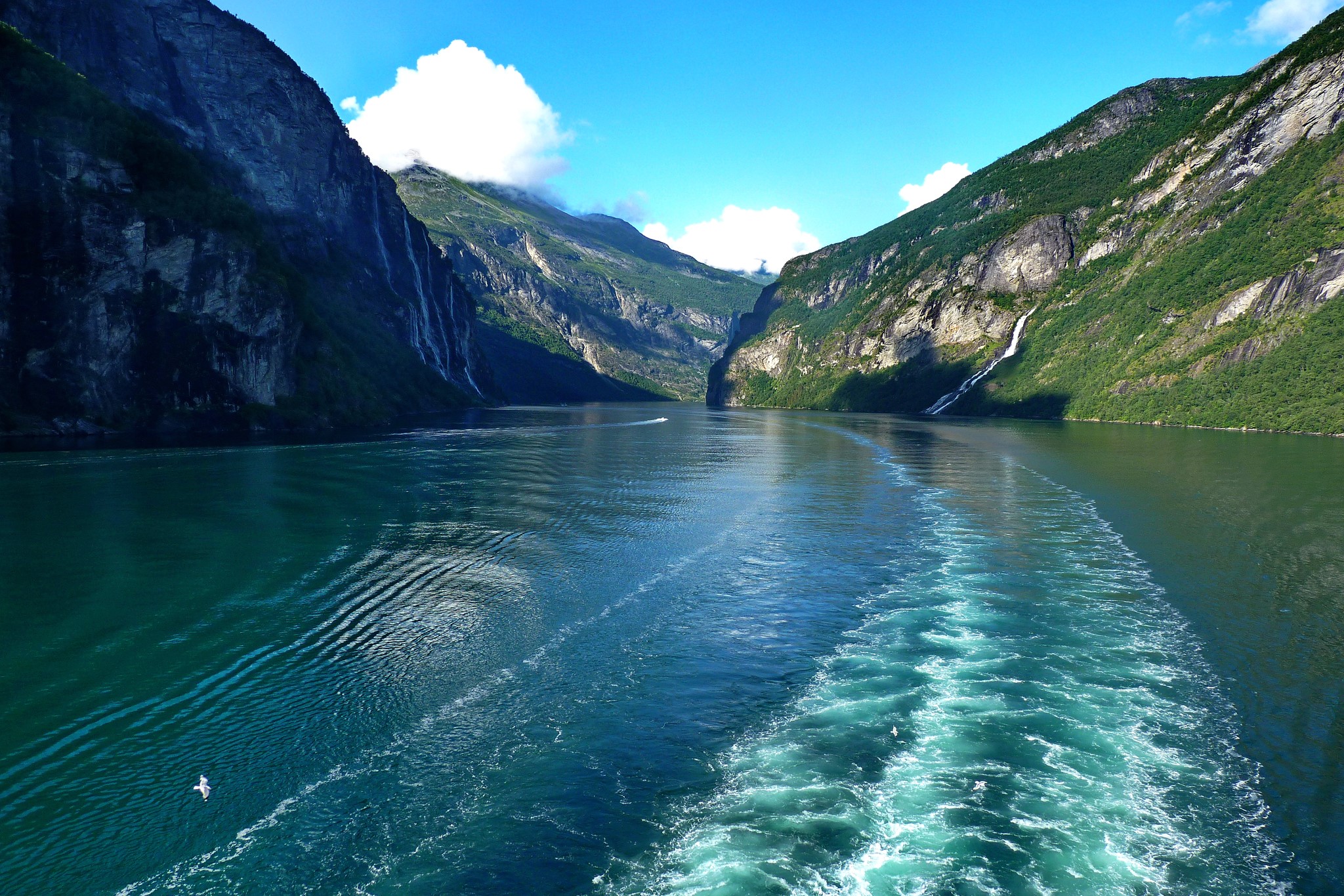 Geirangerfjord, Norway with waterfalls and a boat wake HD Wallpaper