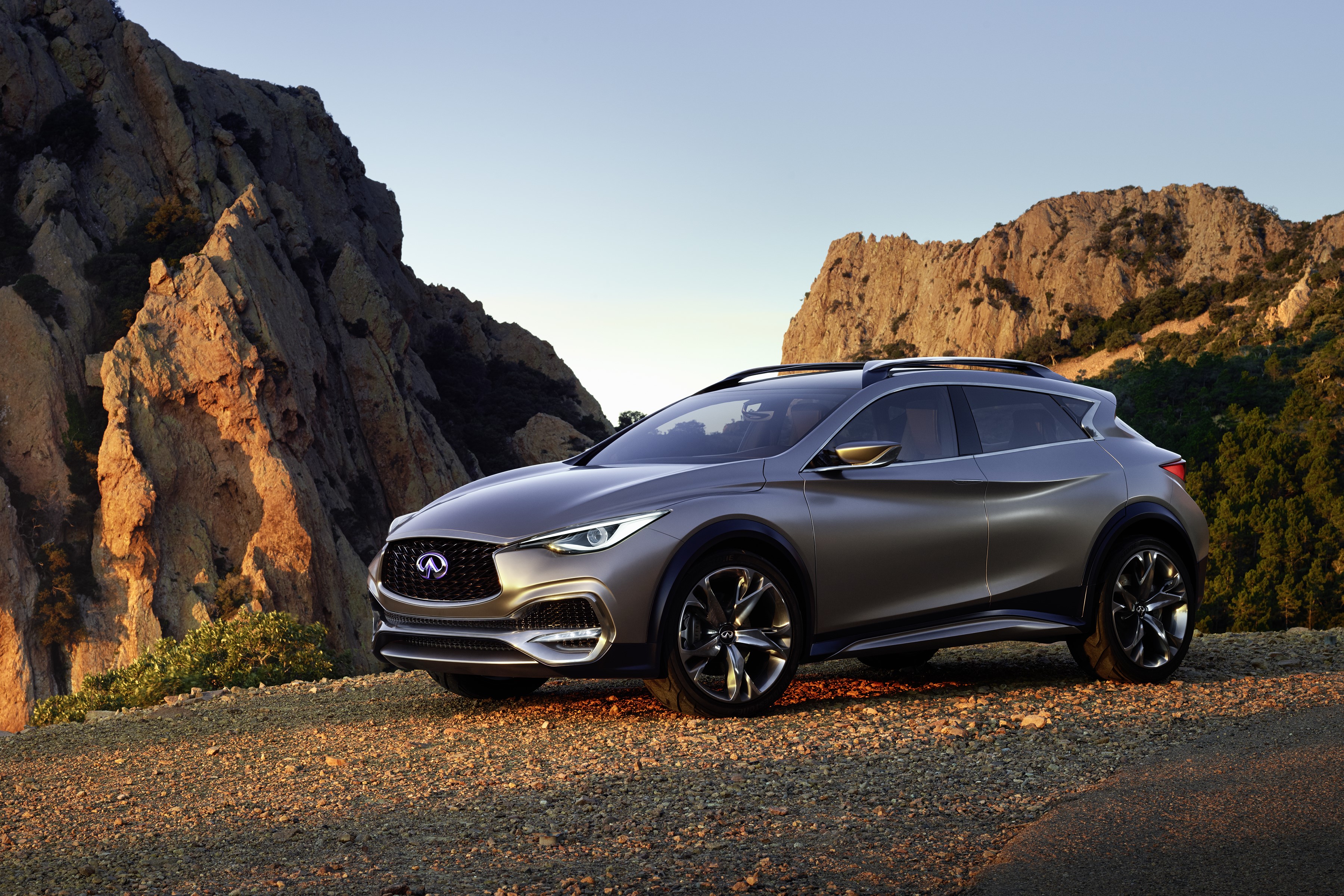 Infiniti QX30 Concept car on rocky terrain HD Wallpaper