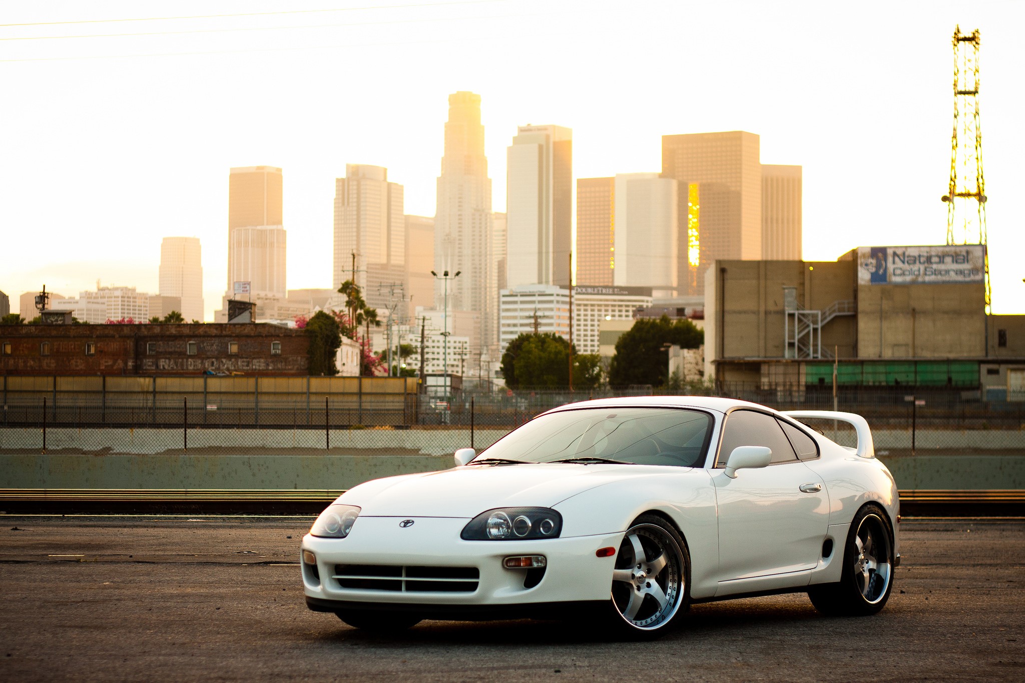 White Toyota Supra with Los Angeles Skyline HD Wallpaper