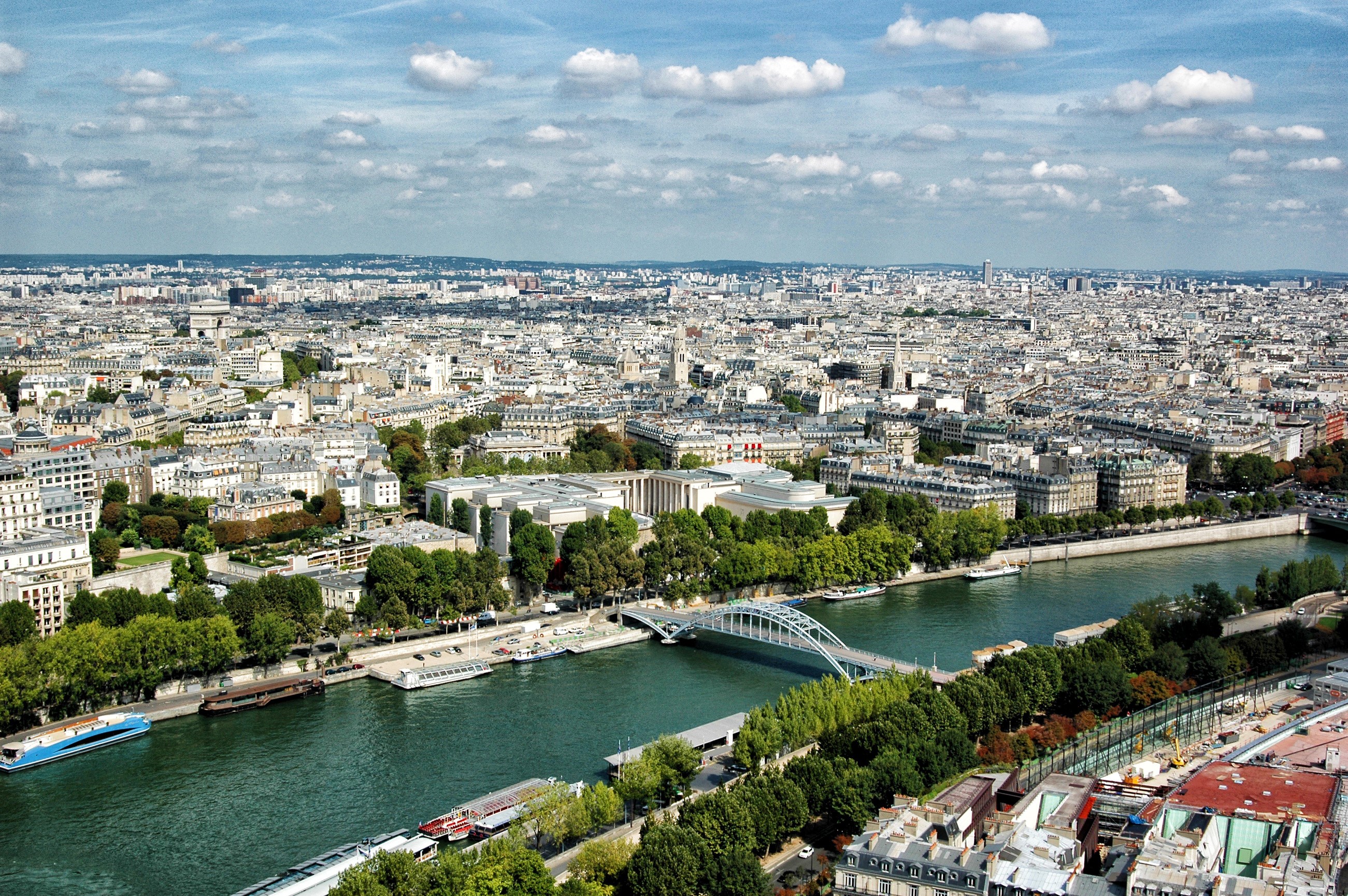 Aerial view of Paris with the Seine River and bridges HD Wallpaper