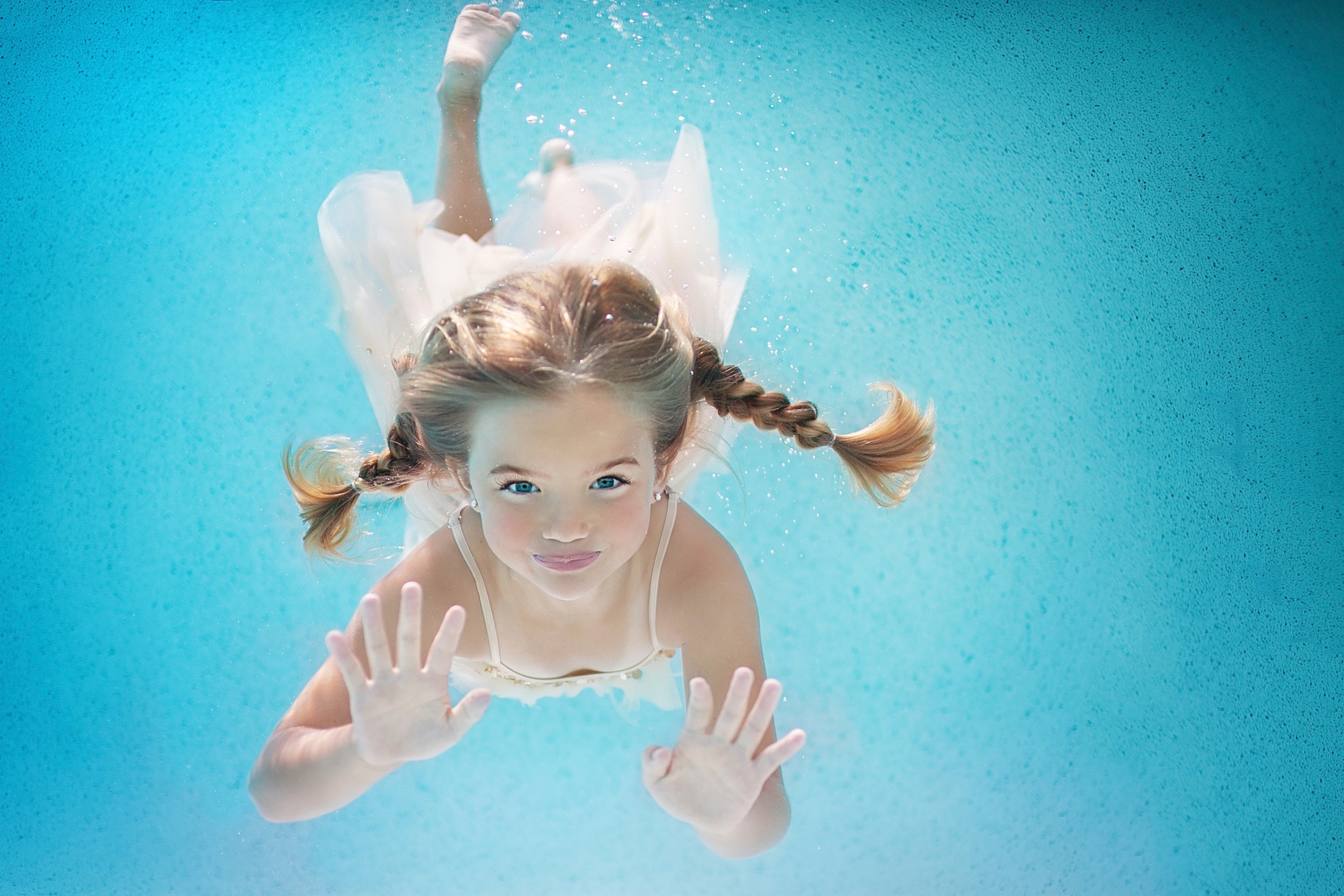 Girl with braided hair underwater in a white dress HD Wallpaper