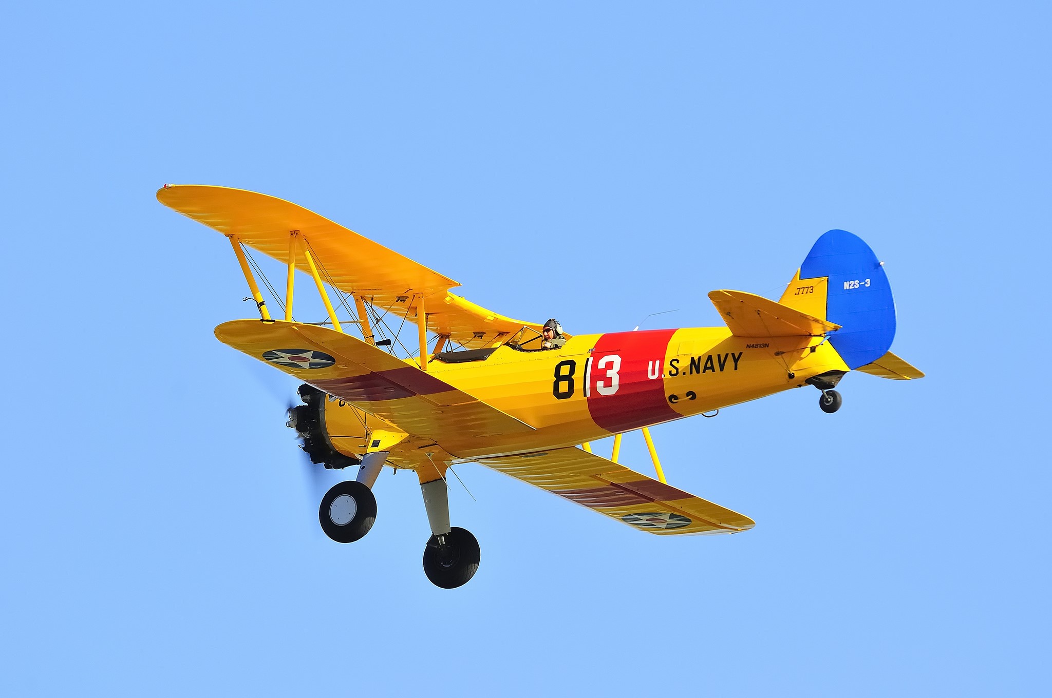 Yellow U.S. Navy Biplane in Flight HD Wallpaper