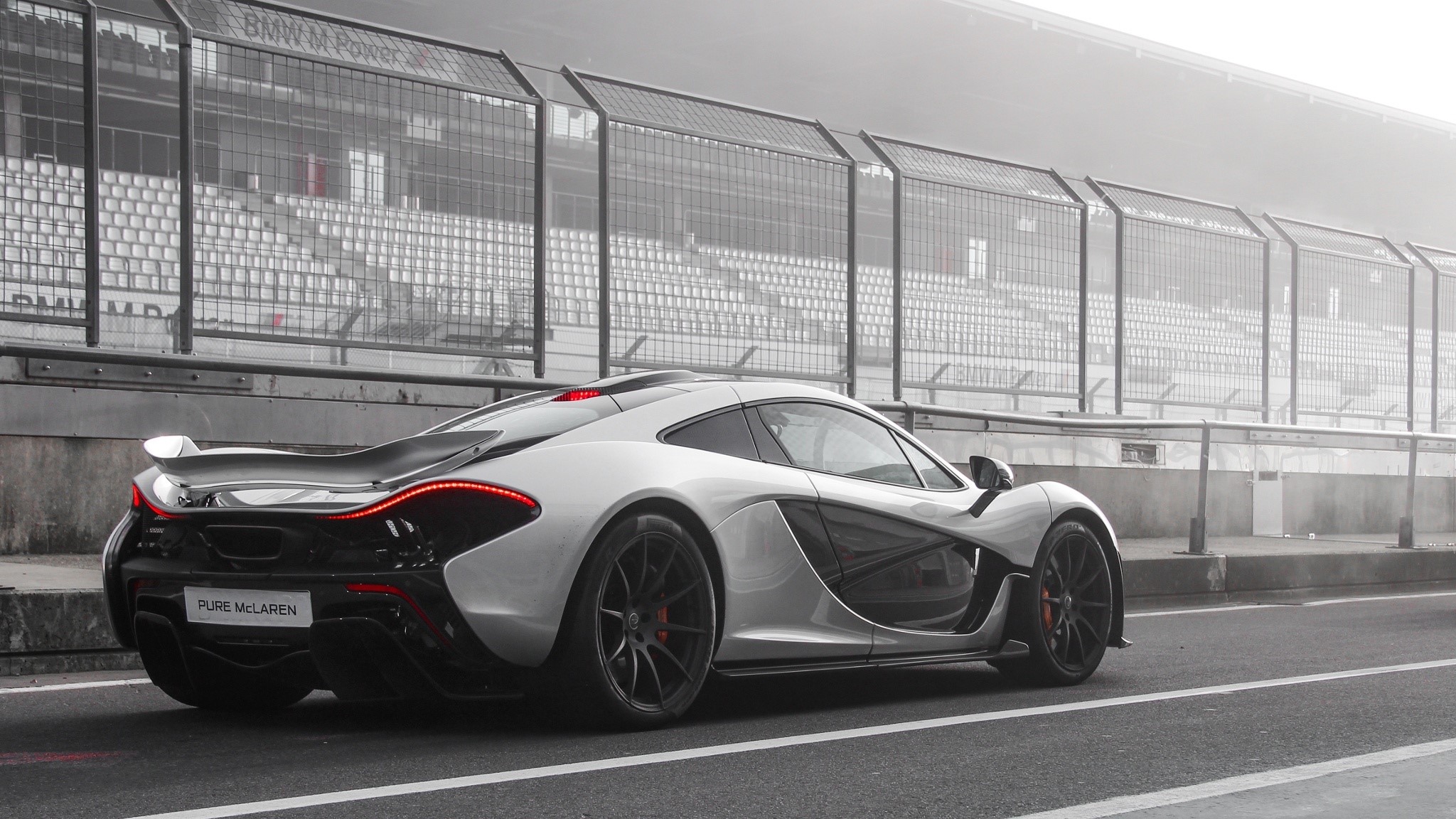 McLaren P1 Hybrid Sports Car on Race Track HD Wallpaper