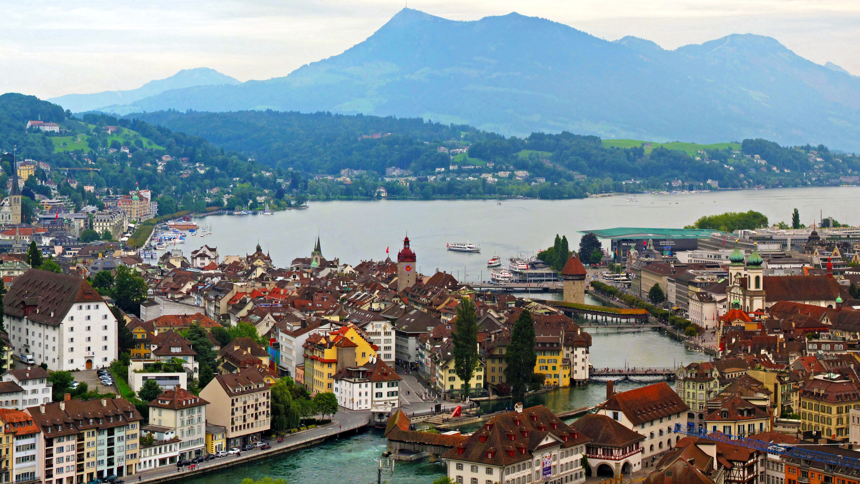 Lucerne, Switzerland cityscape with lake and mountains HD Wallpaper