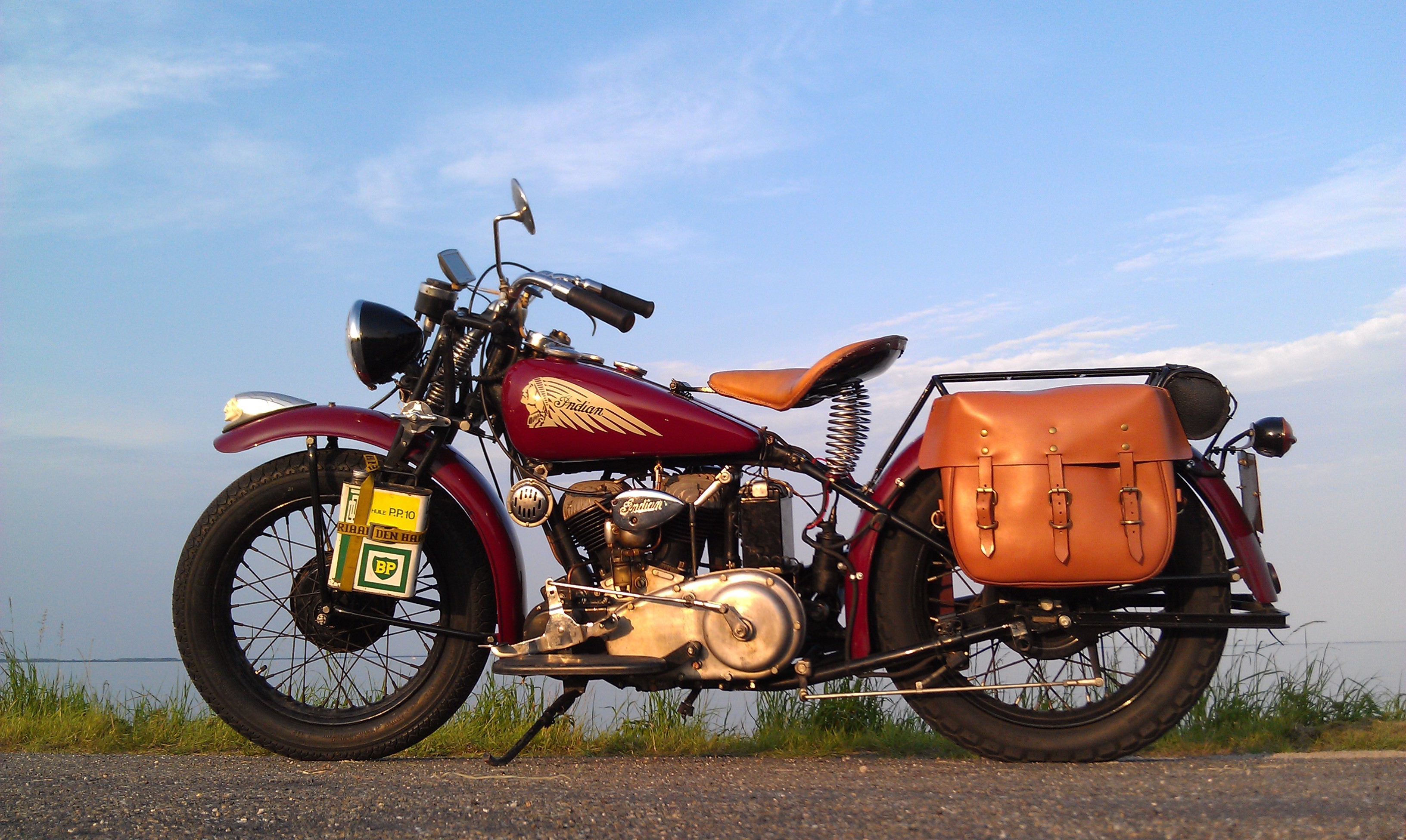 Maroon Indian 741 motorcycle with saddlebags HD Wallpaper