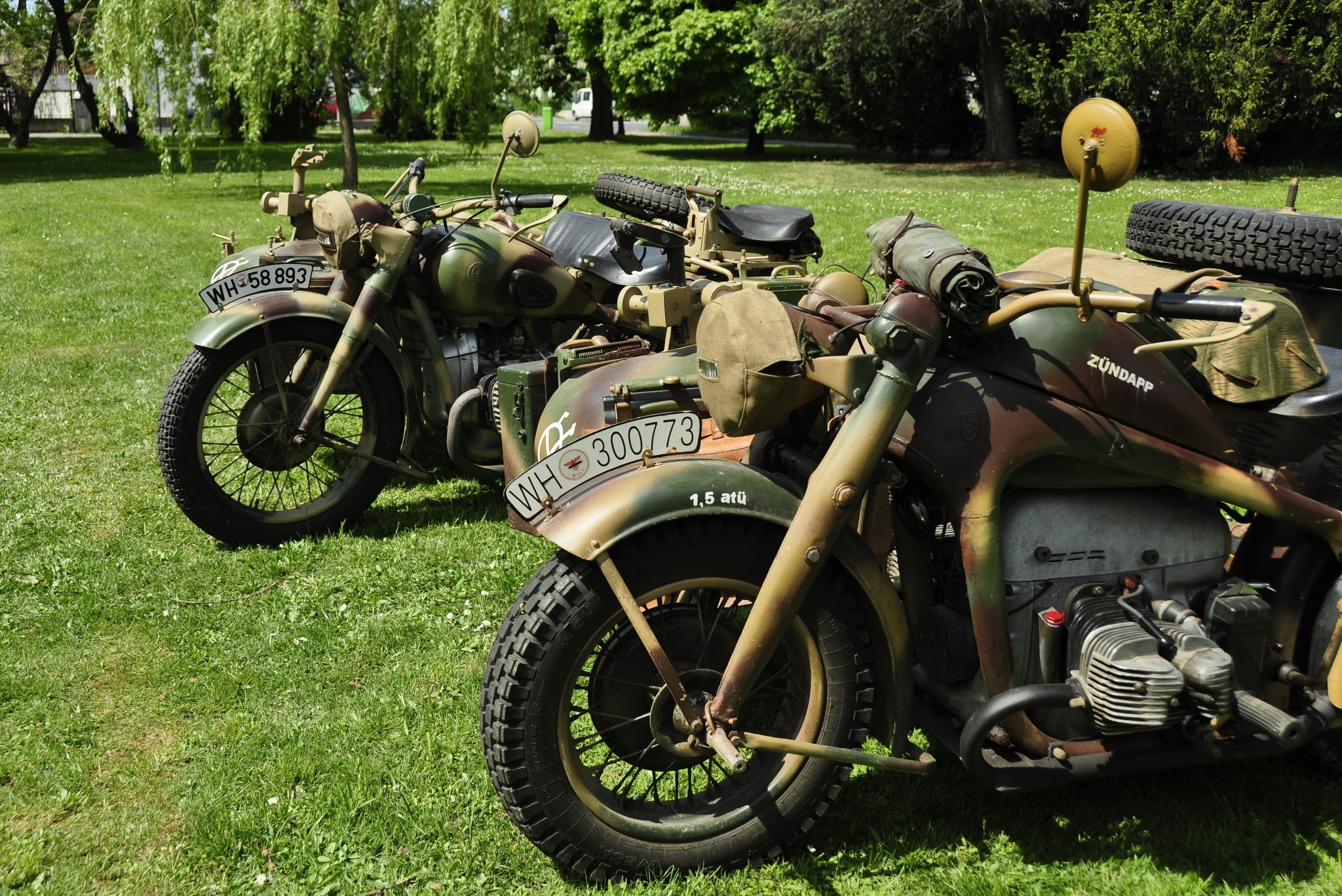 Two vintage military motorcycles with sidecars on grass HD Wallpaper