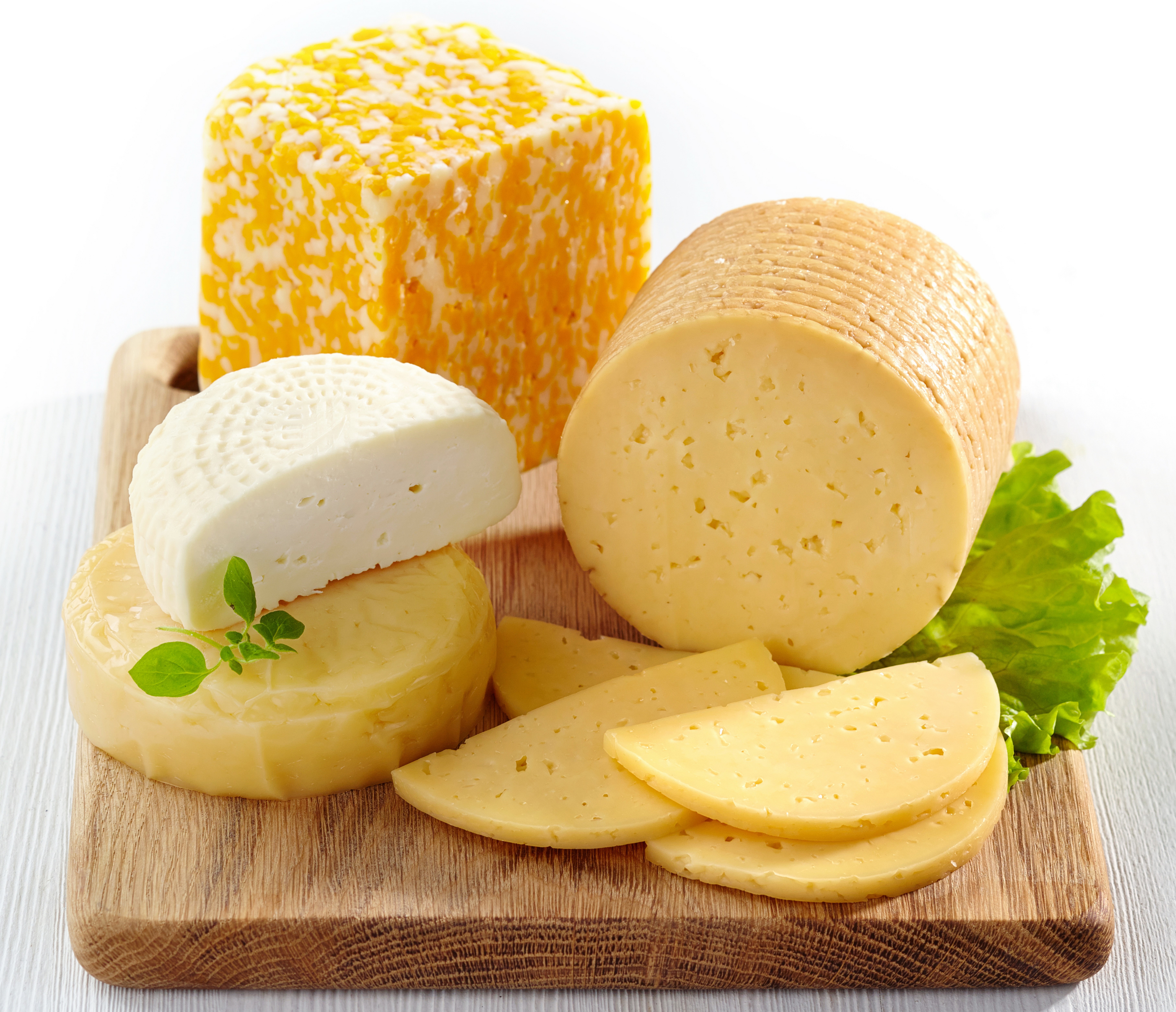 Assortment of Cheeses on a Wooden Board HD Wallpaper