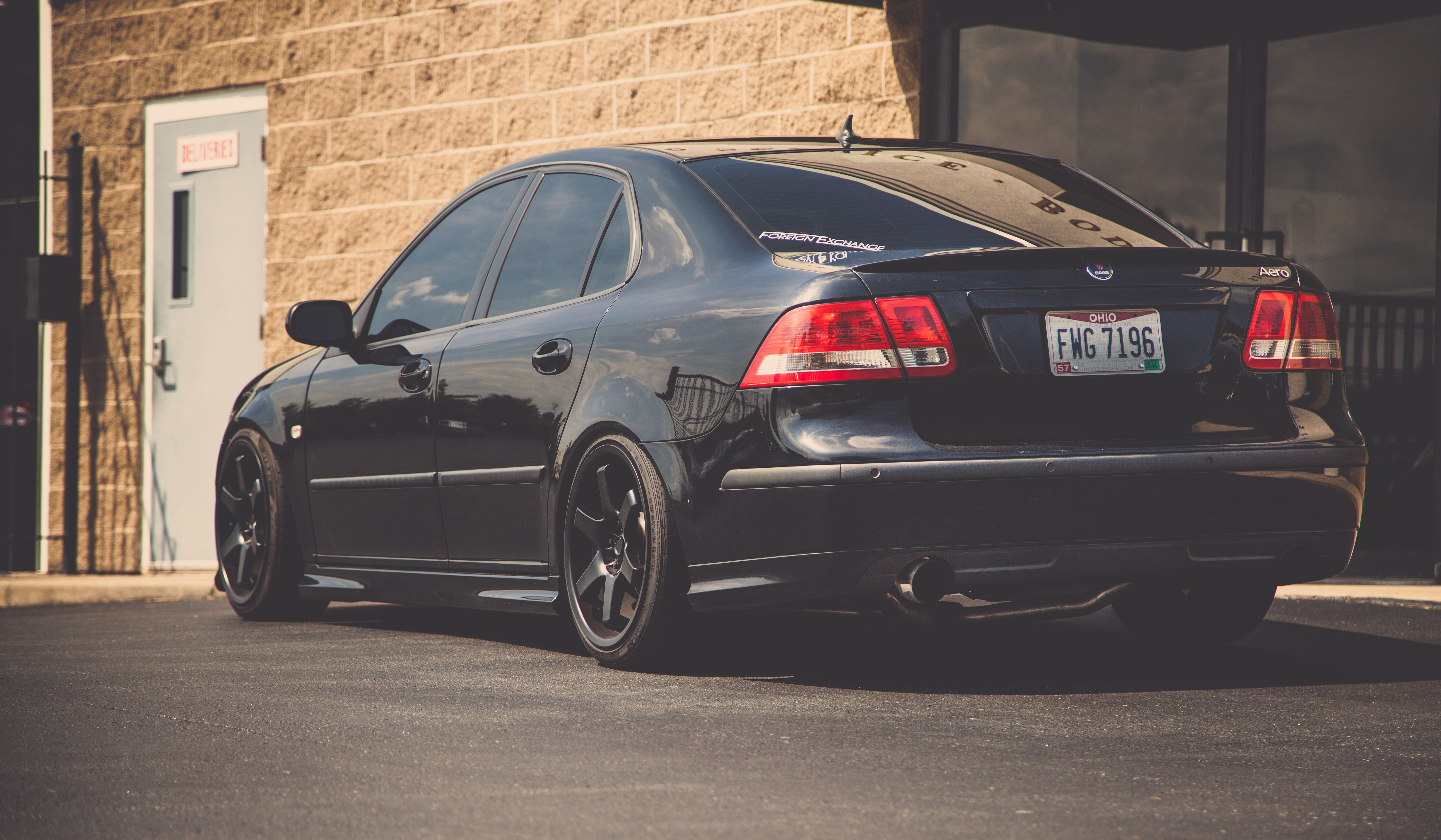 4K Back View of Black Saab 9-3 Aero HD Wallpaper