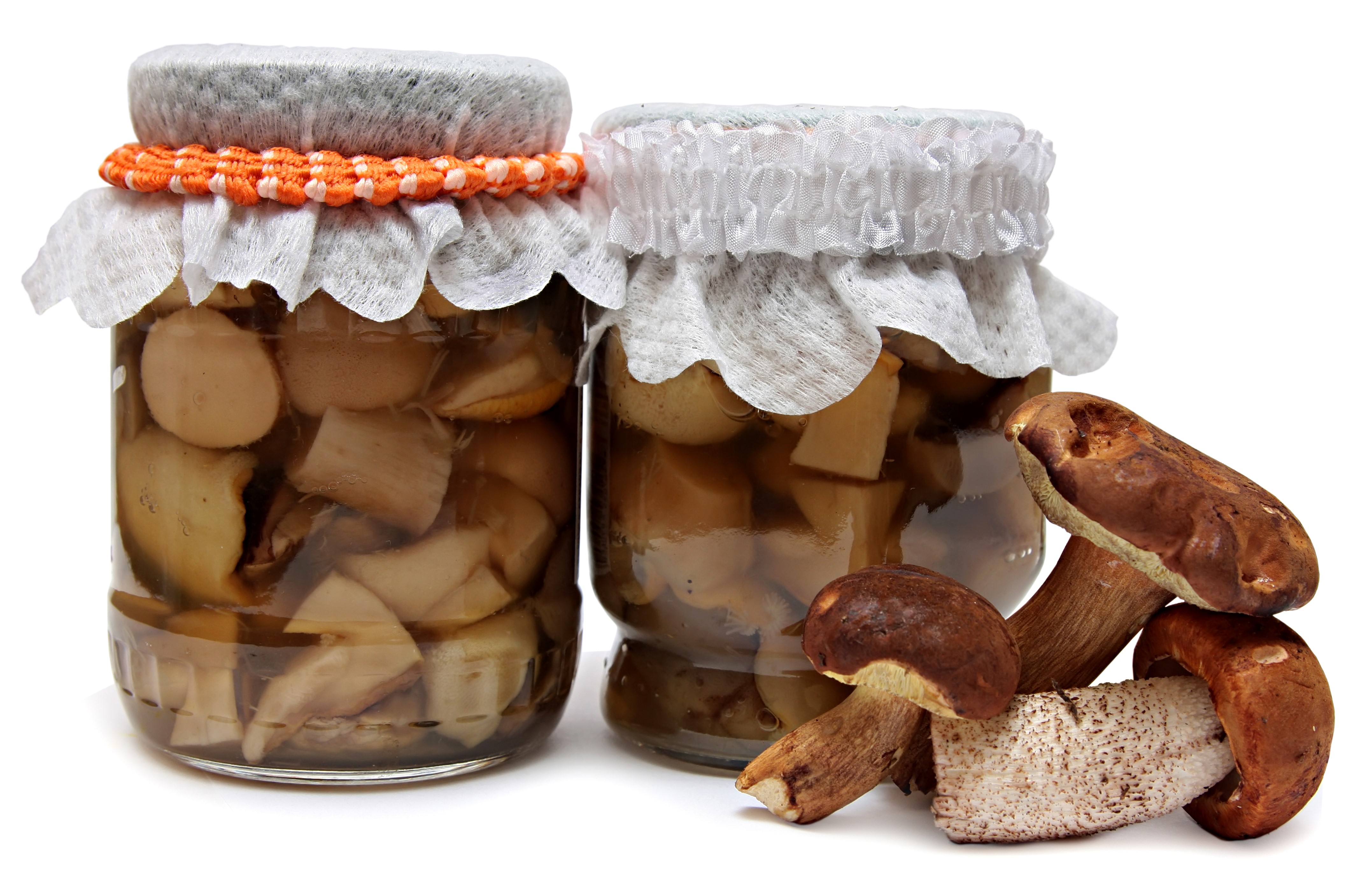 Two jars of pickled mushrooms with fresh mushrooms HD Wallpaper