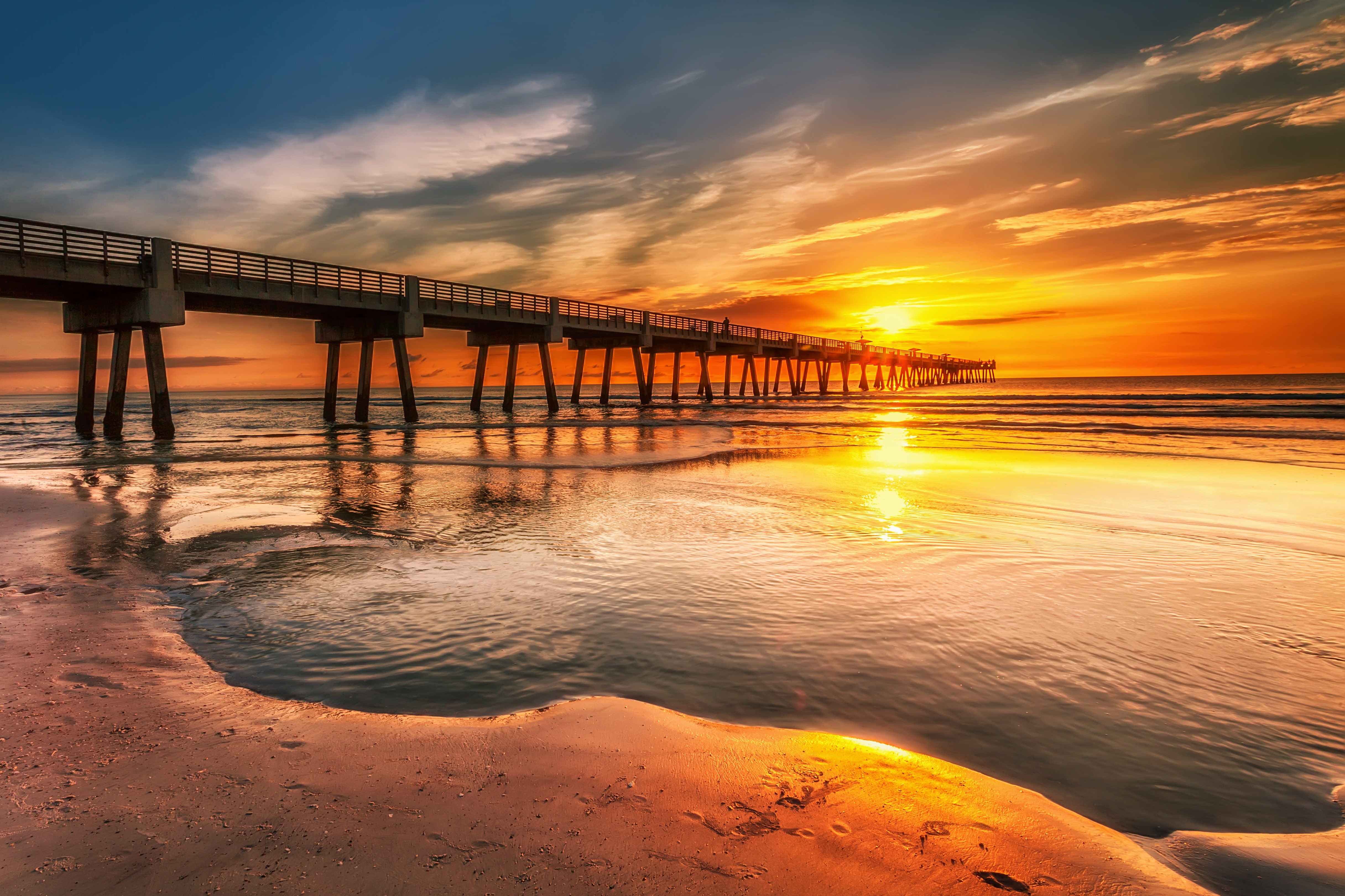 4K Sunrise over a Pier and Beach HD Wallpaper