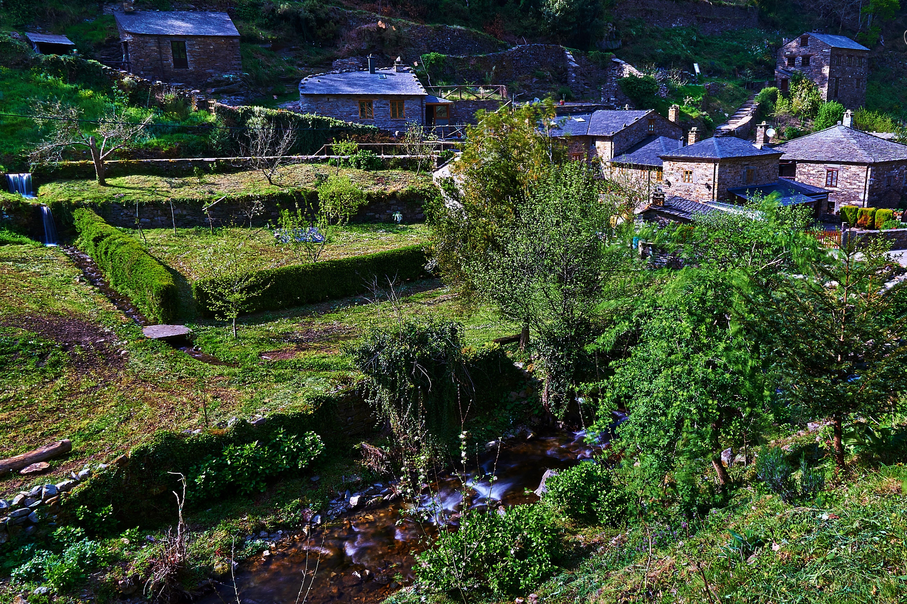 As Veigas, Asturias, Spain: Stone houses on a hillside HD Wallpaper