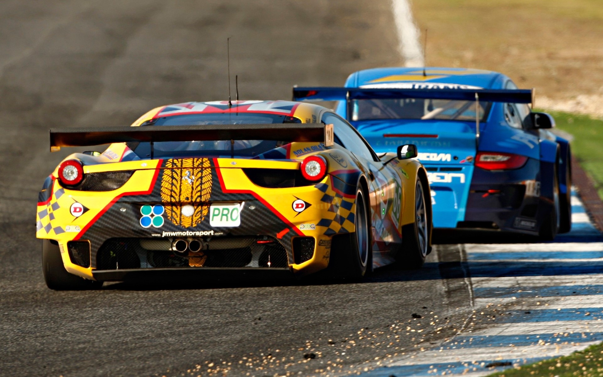 Ferrari 458 GTC and Porsche 911 race cars HD Wallpaper