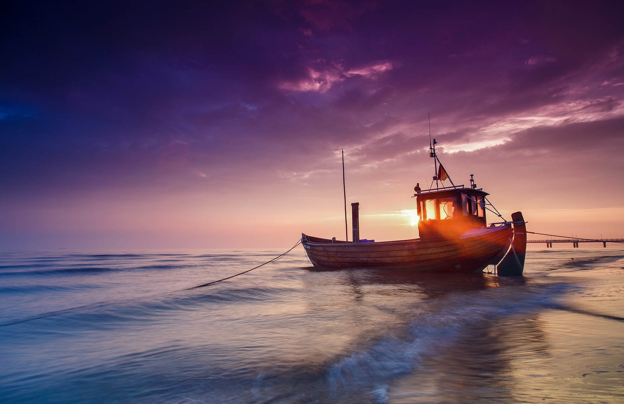 Fishing boat on the Baltic Sea at sunset HD Wallpaper