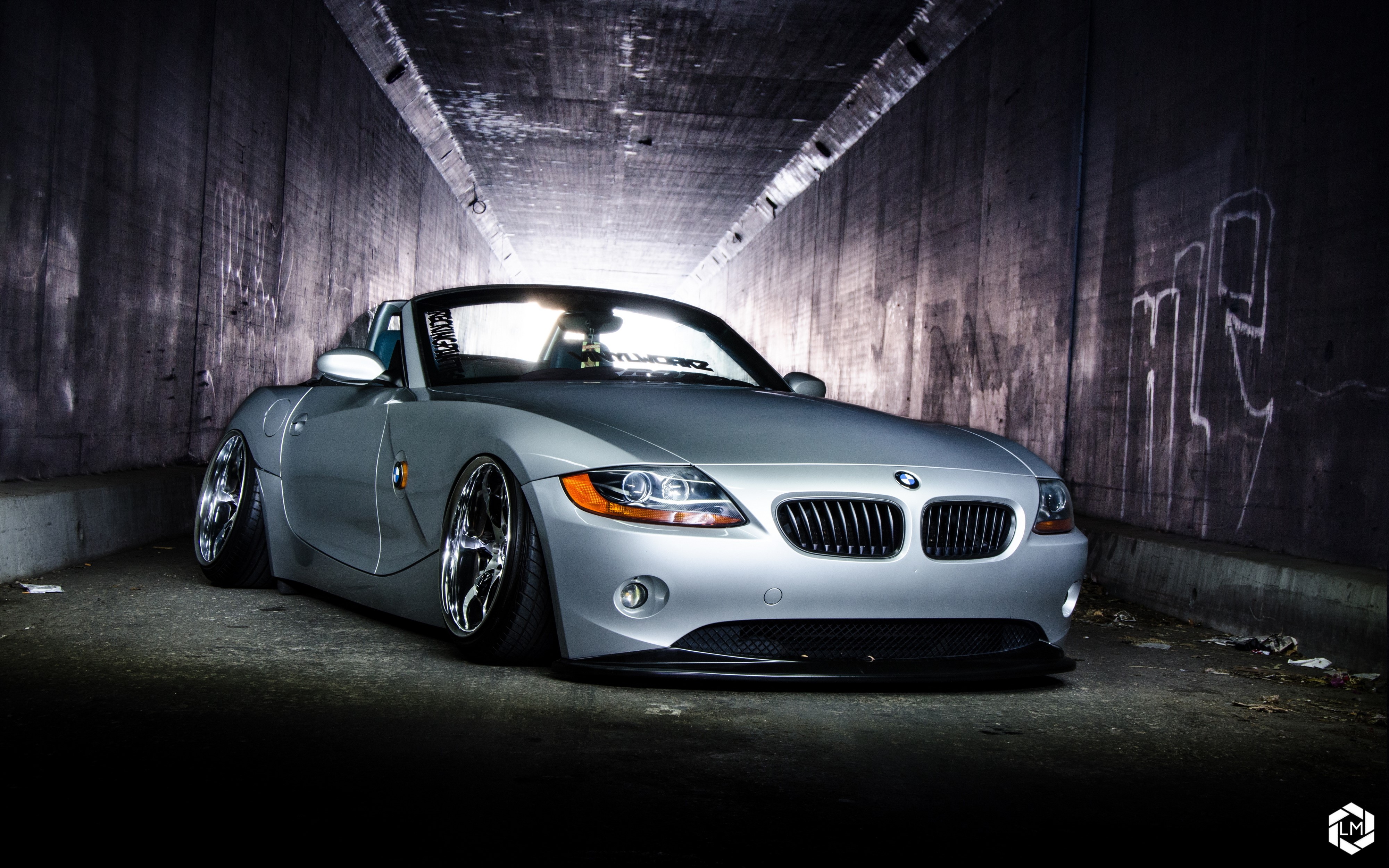 Silver BMW Z4 convertible in a tunnel HD Wallpaper
