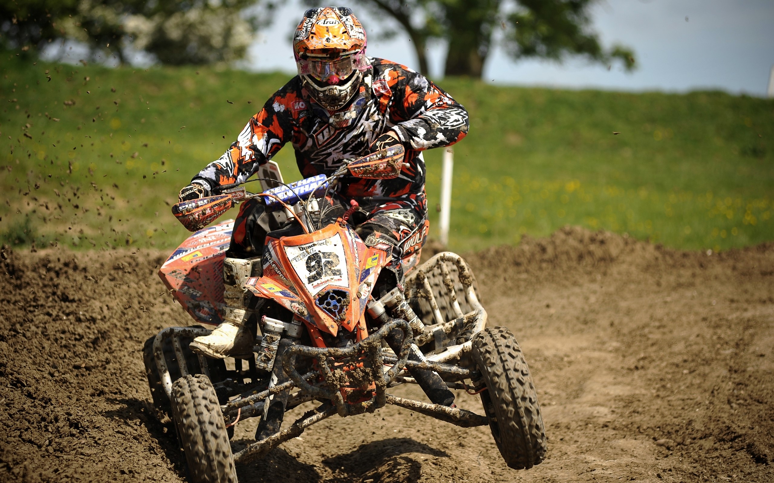 Motocross rider on a quad bike on a dirt track HD Wallpaper