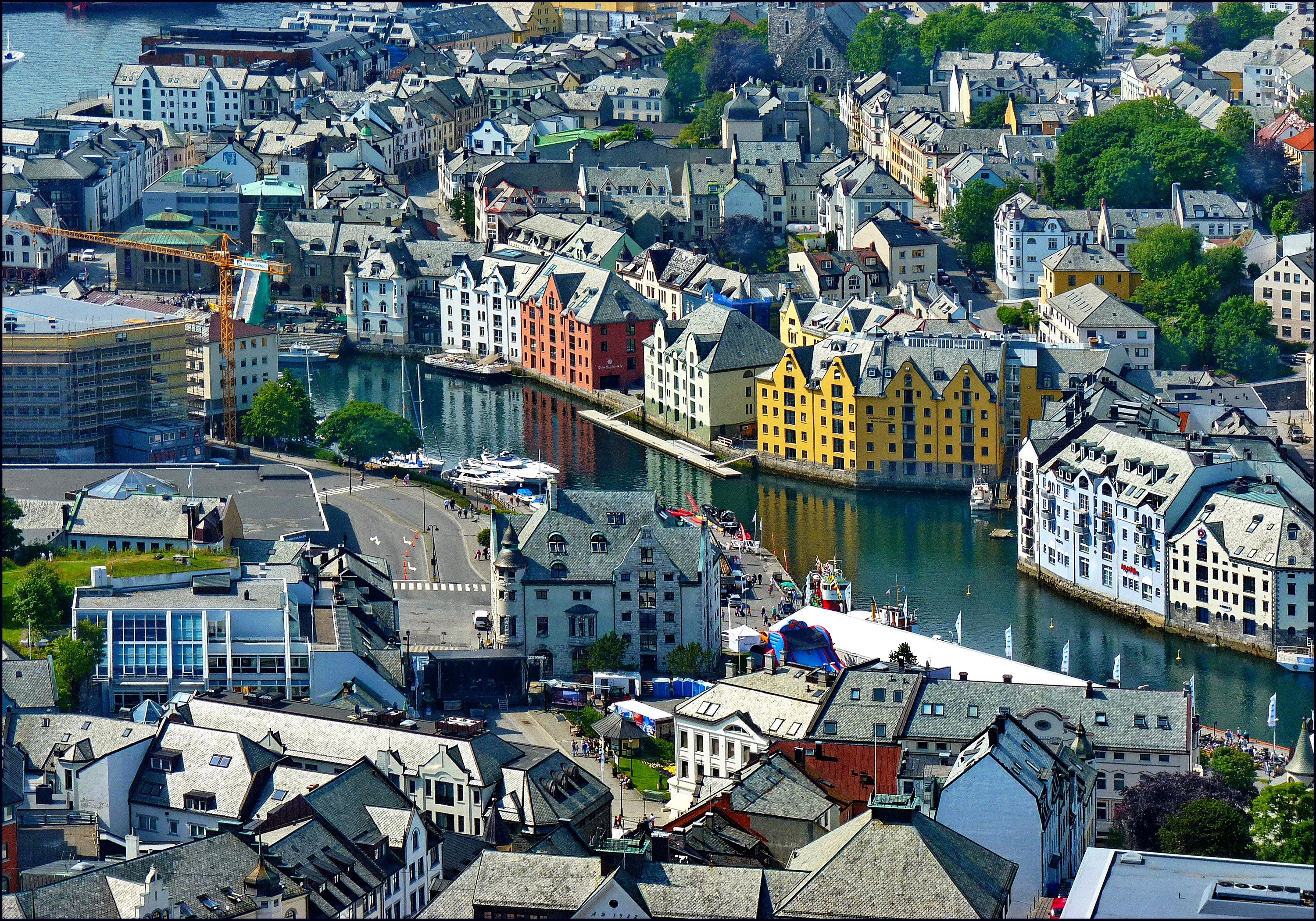 Alesund, Norway waterfront with colorful buildings and canal HD Wallpaper
