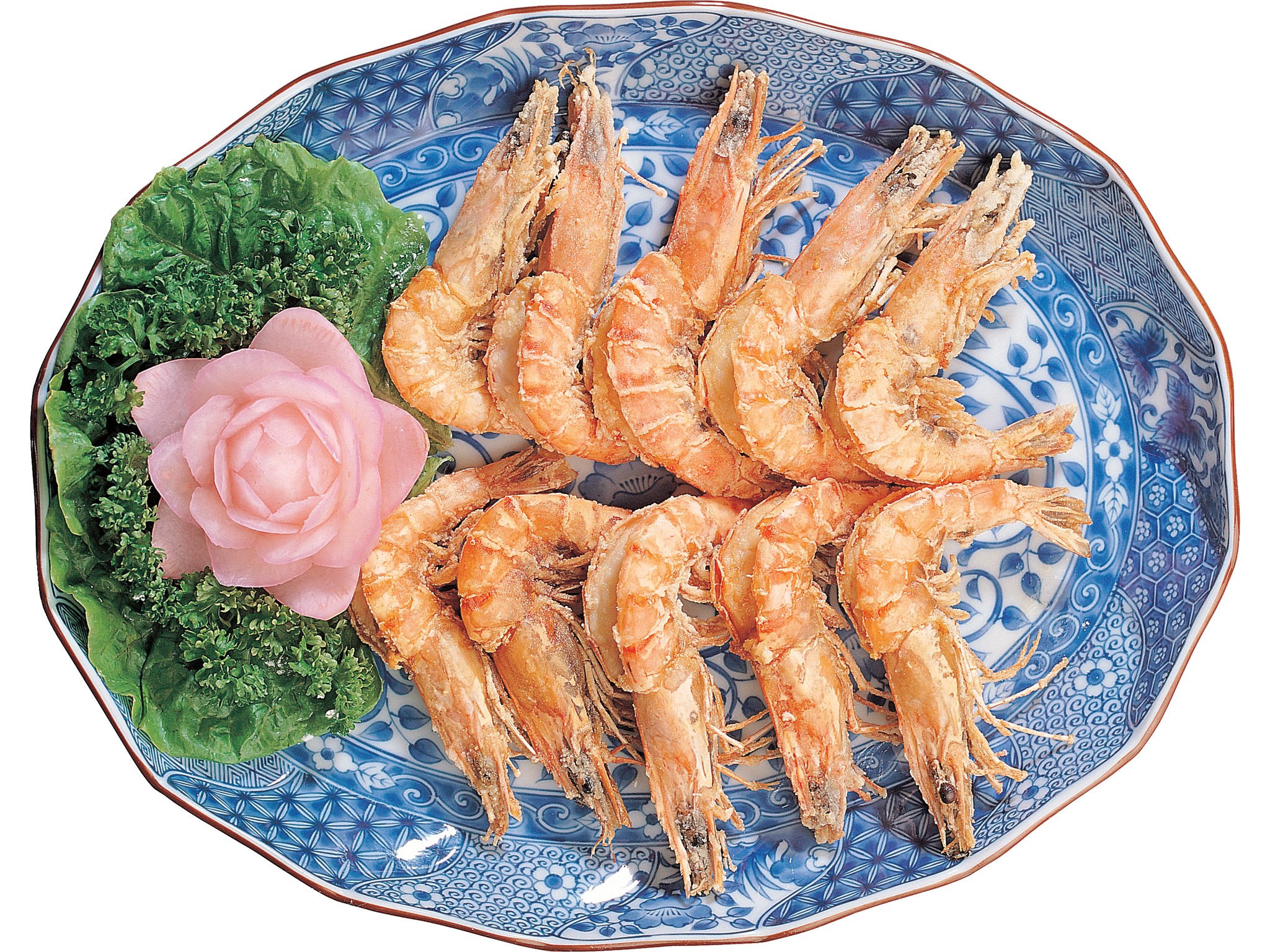 Fried shrimp on a decorative blue and white plate with garnish HD Wallpaper