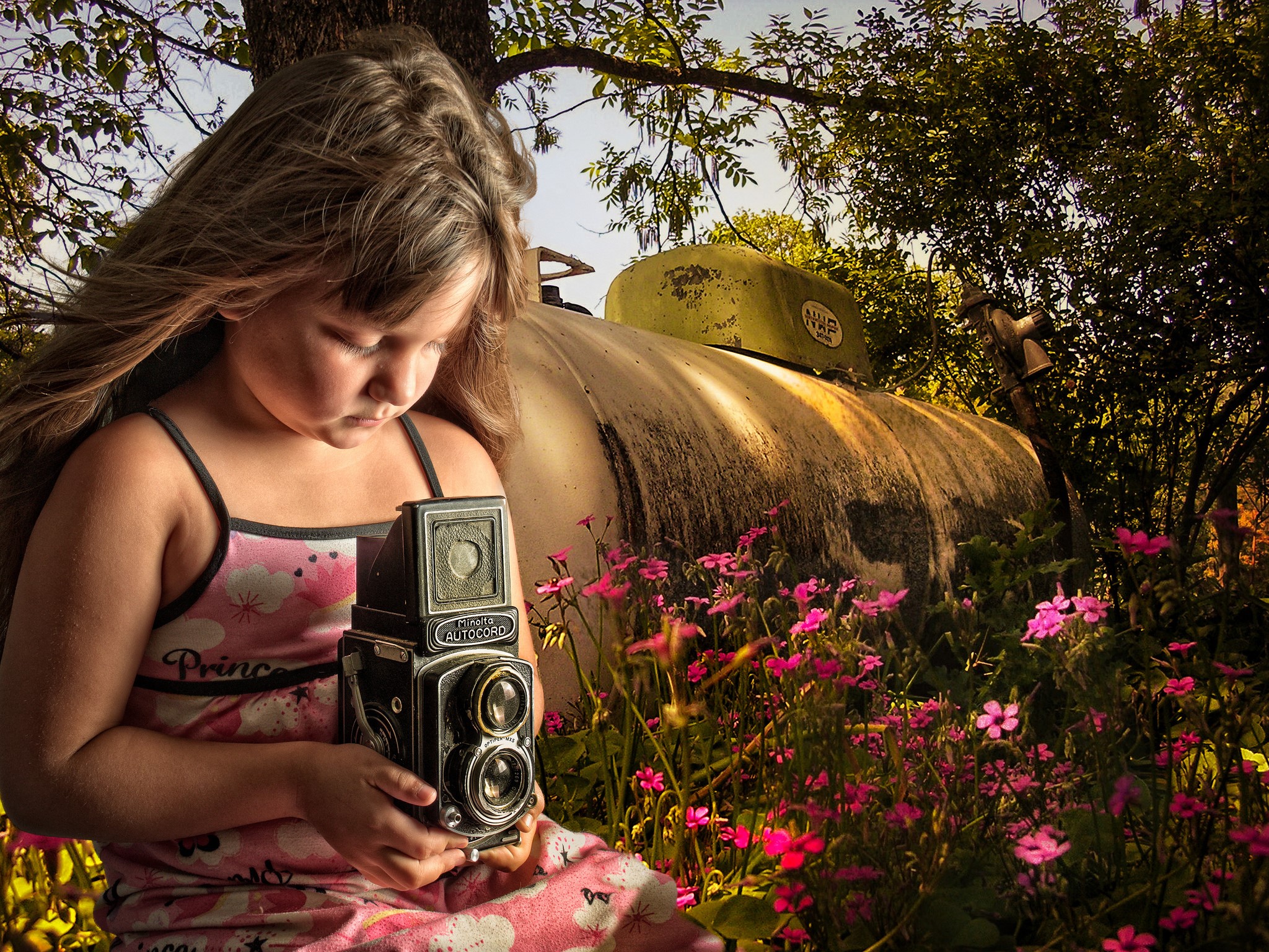 Girl with a vintage camera in a garden HD Wallpaper