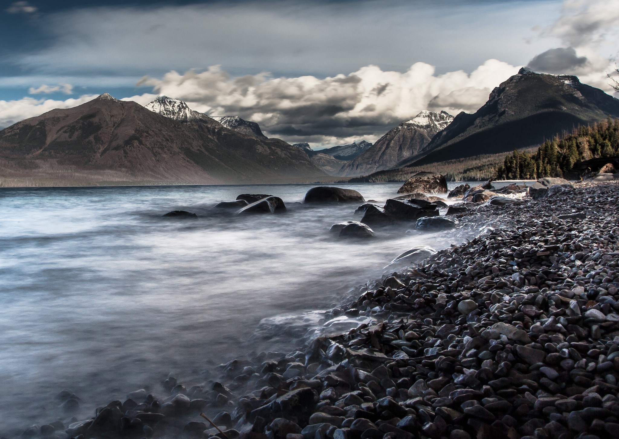 Lake and Mountains with Rocky Shoreline HD Wallpaper