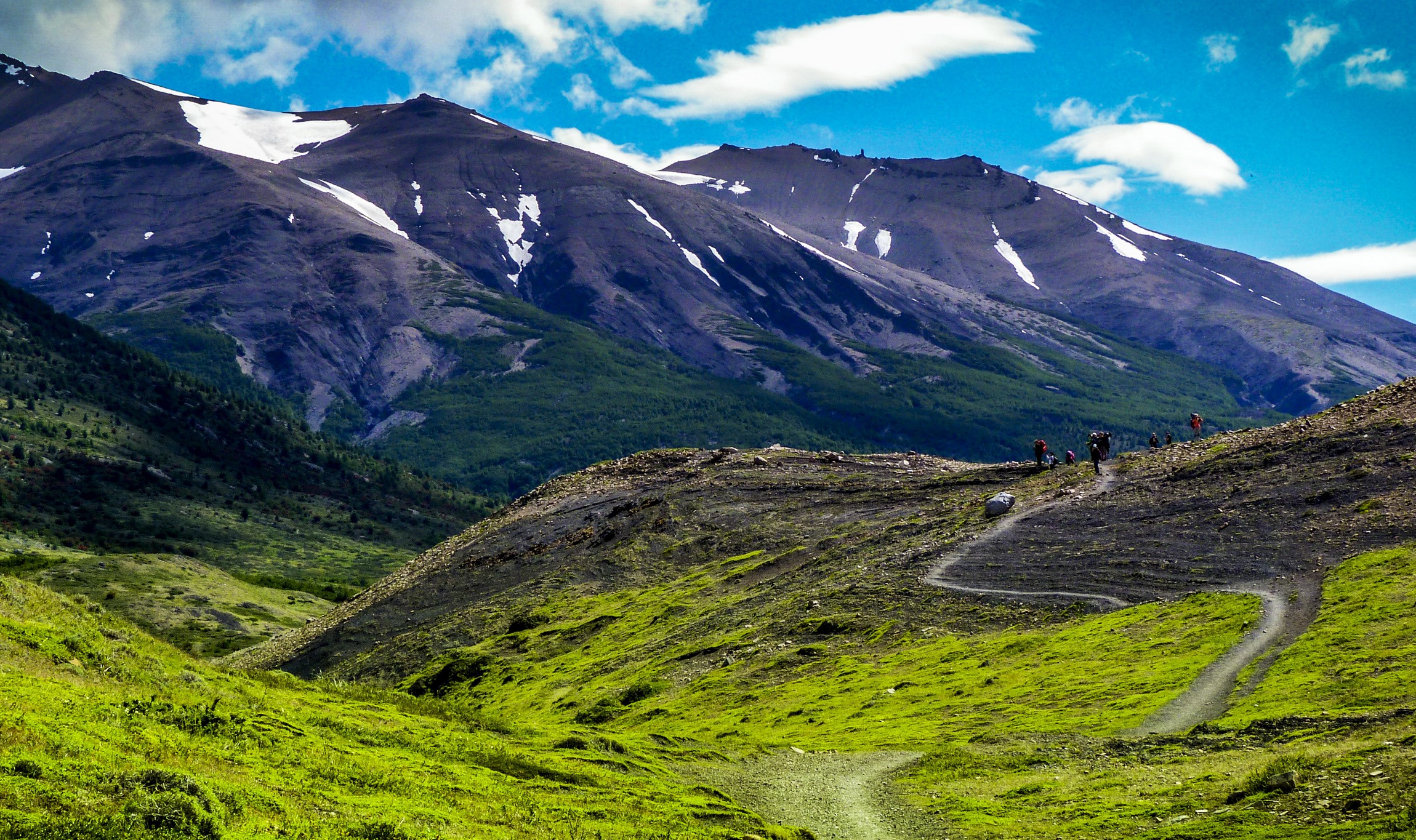 Hikers on a trail in Patagonia, Chile HD Wallpaper