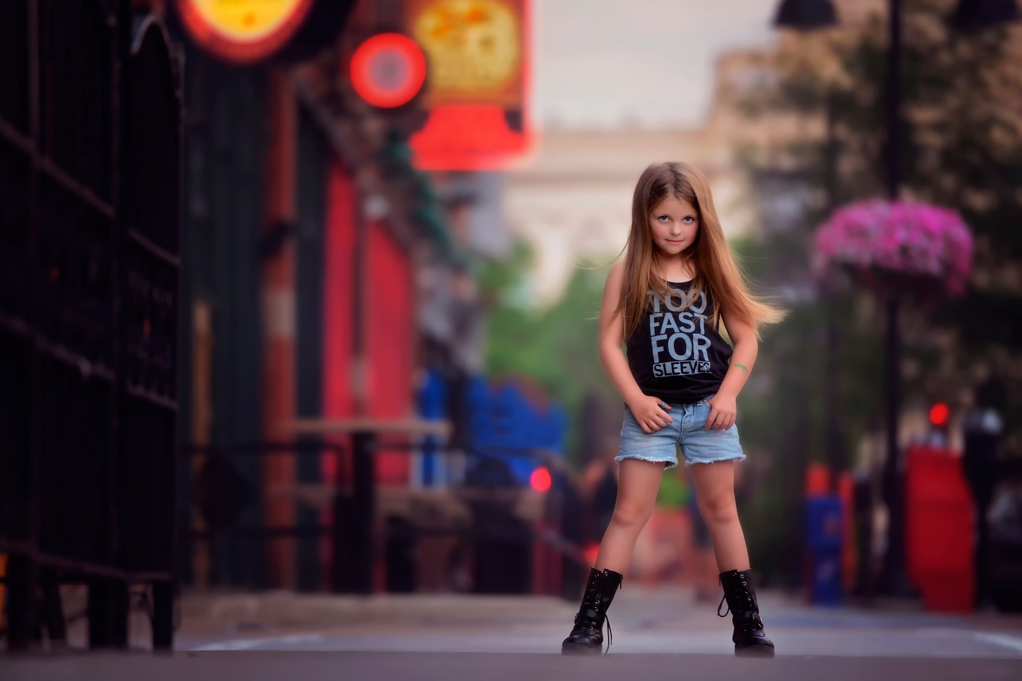 Confident Little Girl Standing on City Street HD Wallpaper