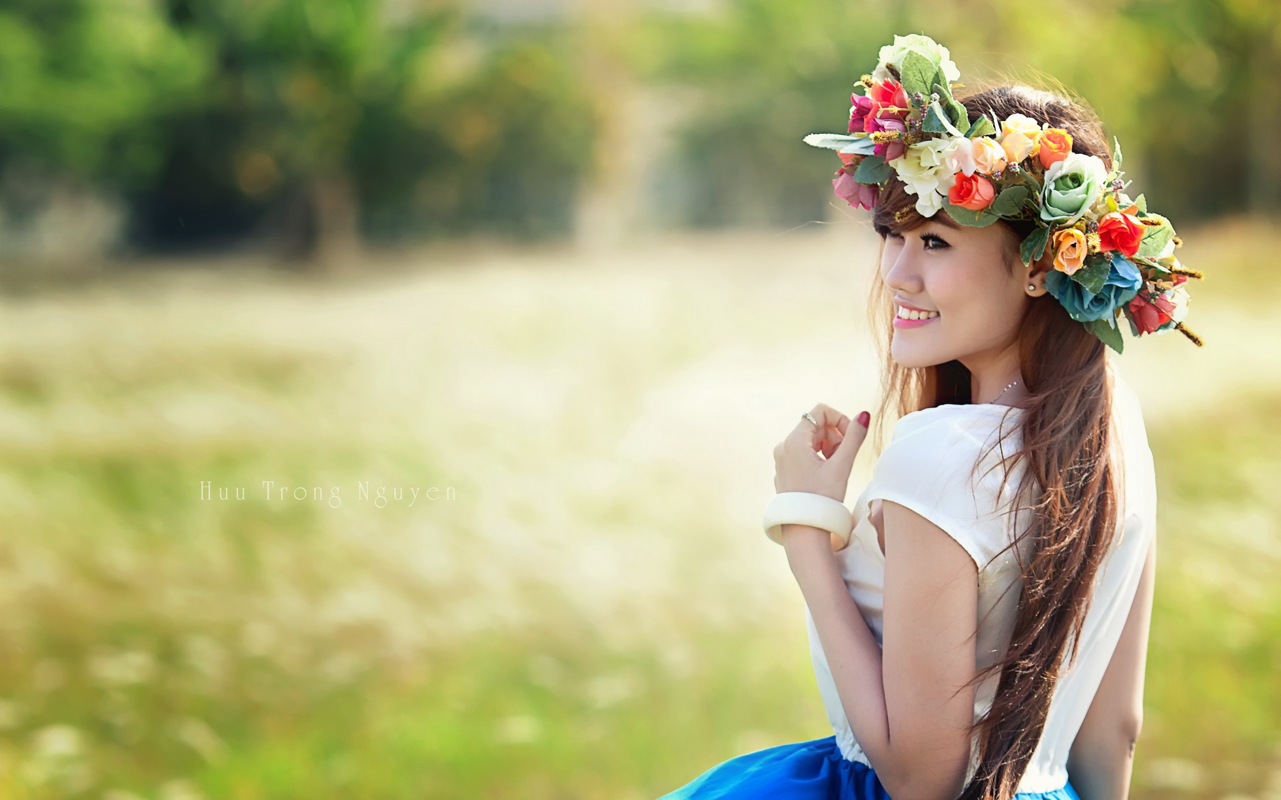 Smiling Woman with Flower Crown in Nature HD Wallpaper