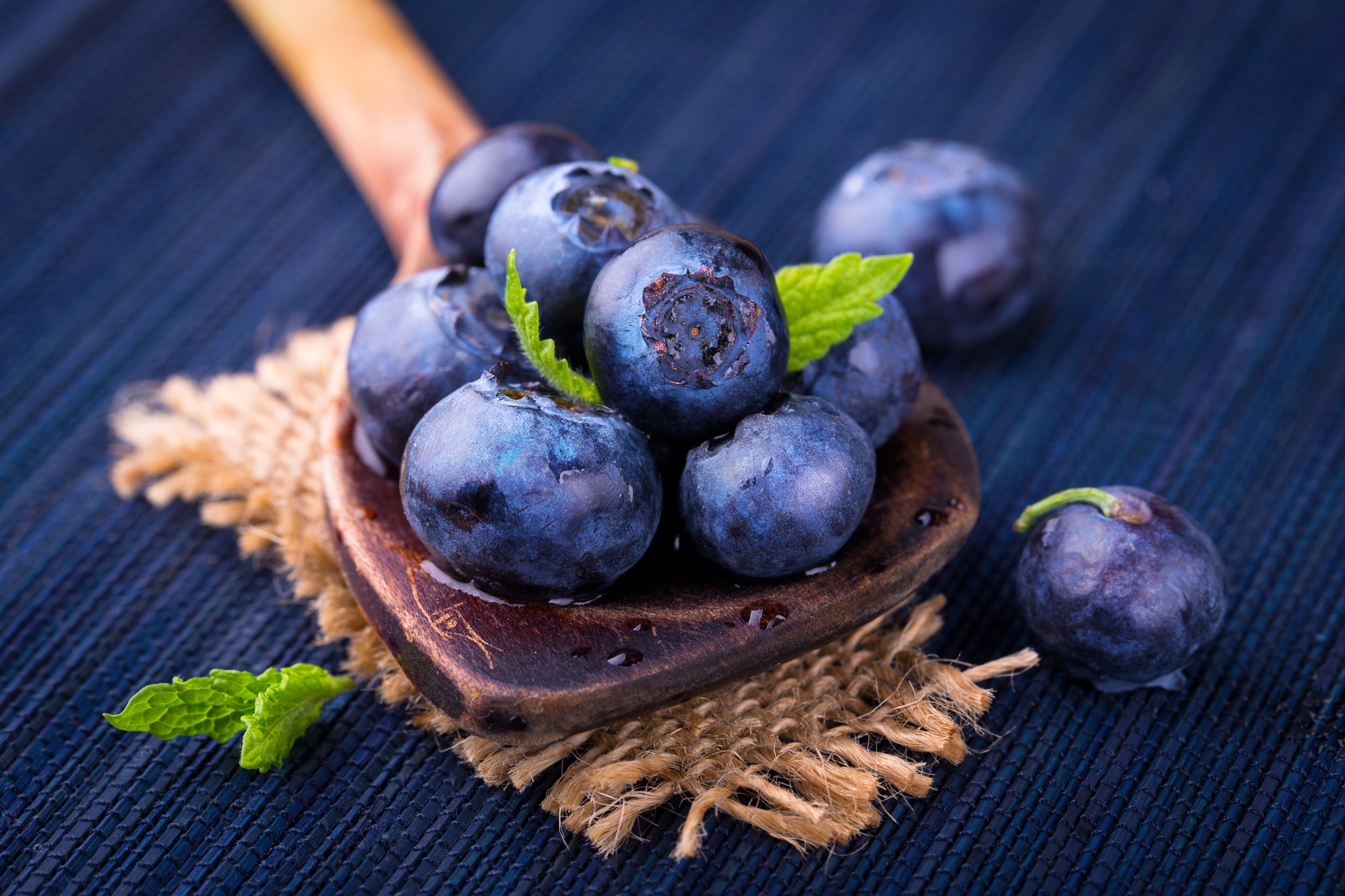 Blueberries on a wooden spoon HD Wallpaper