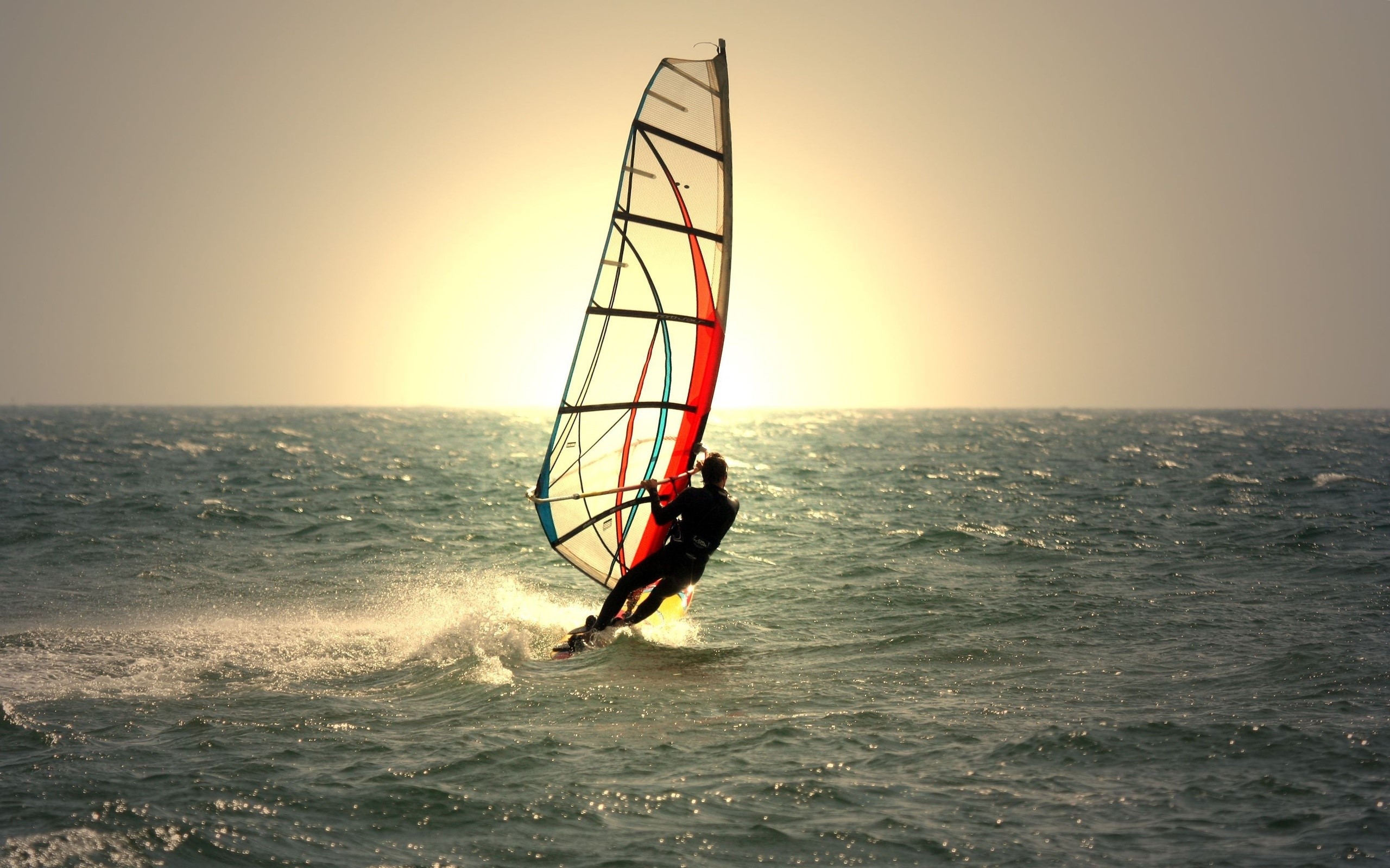 Windsurfer on the sea at sunset HD Wallpaper