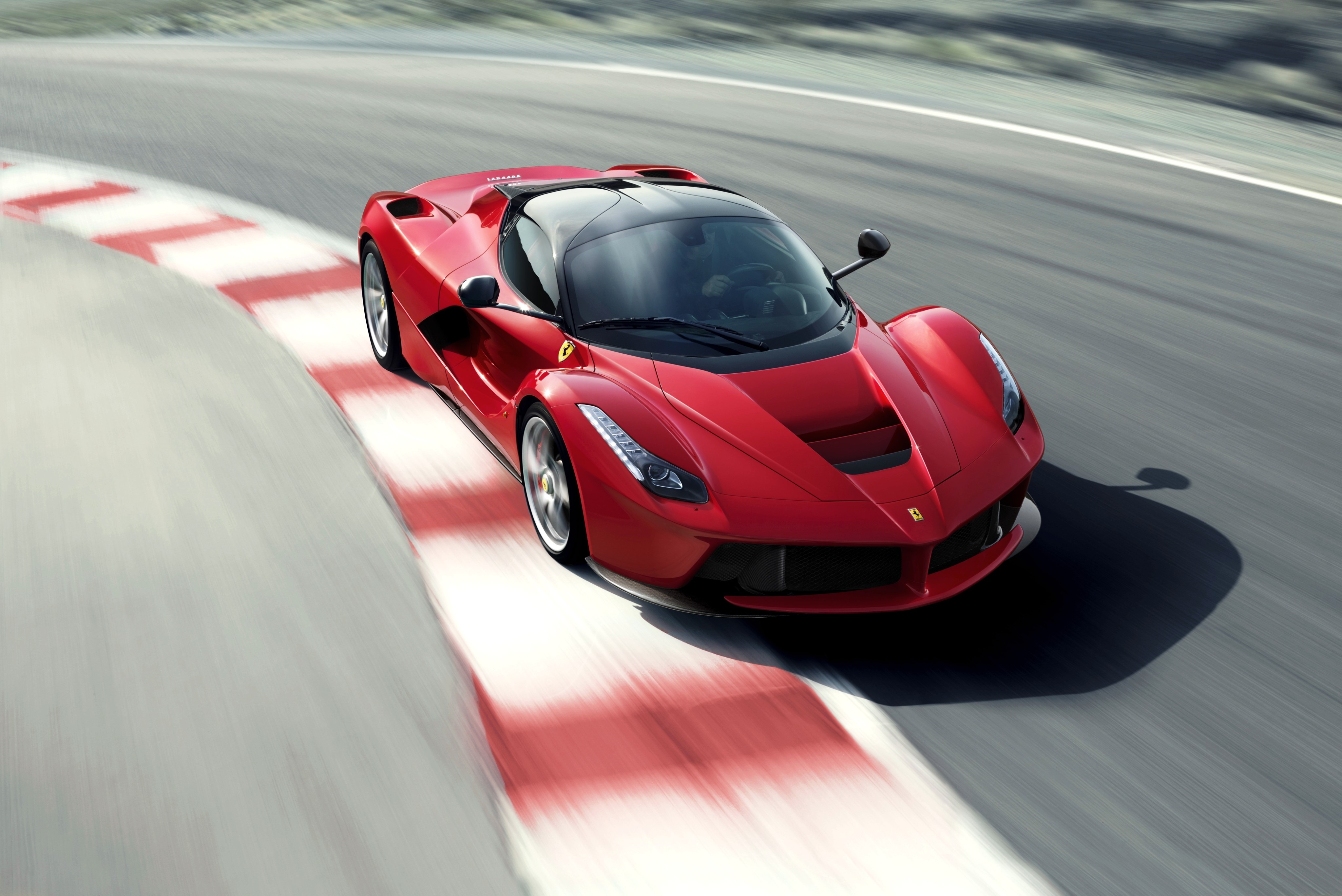 Red Ferrari LaFerrari FXX on a Racetrack HD Wallpaper