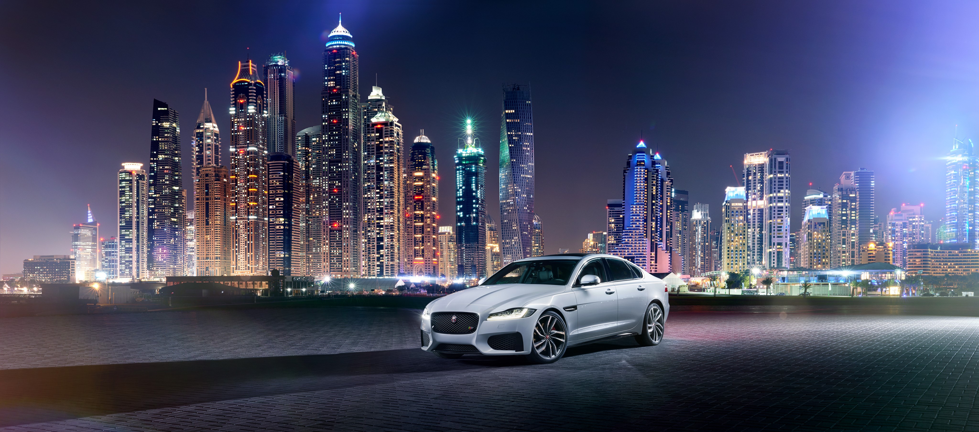White Jaguar 2015 XF S AWD in Dubai at Night HD Wallpaper