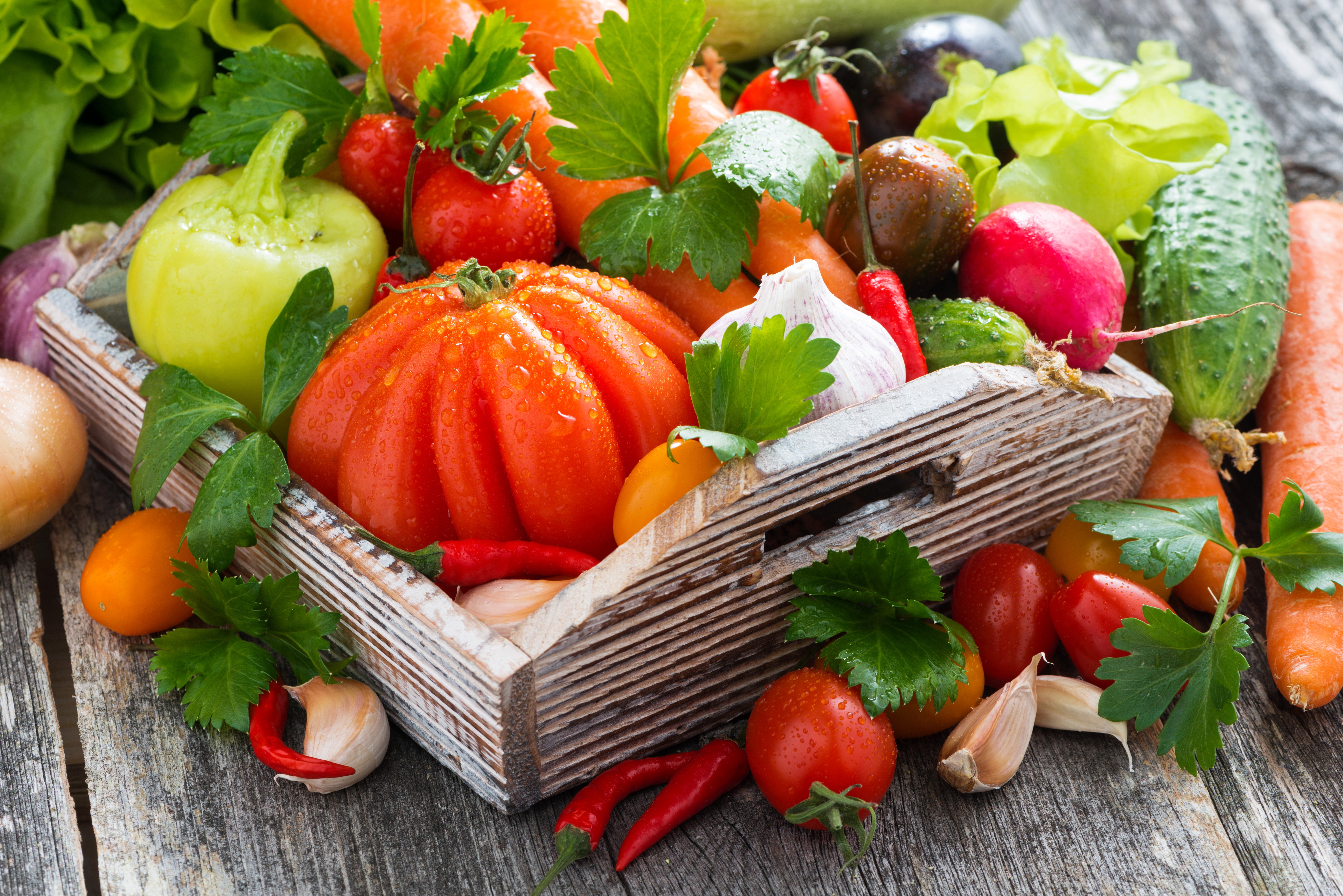 Assortment of fresh vegetables in a wooden crate HD Wallpaper