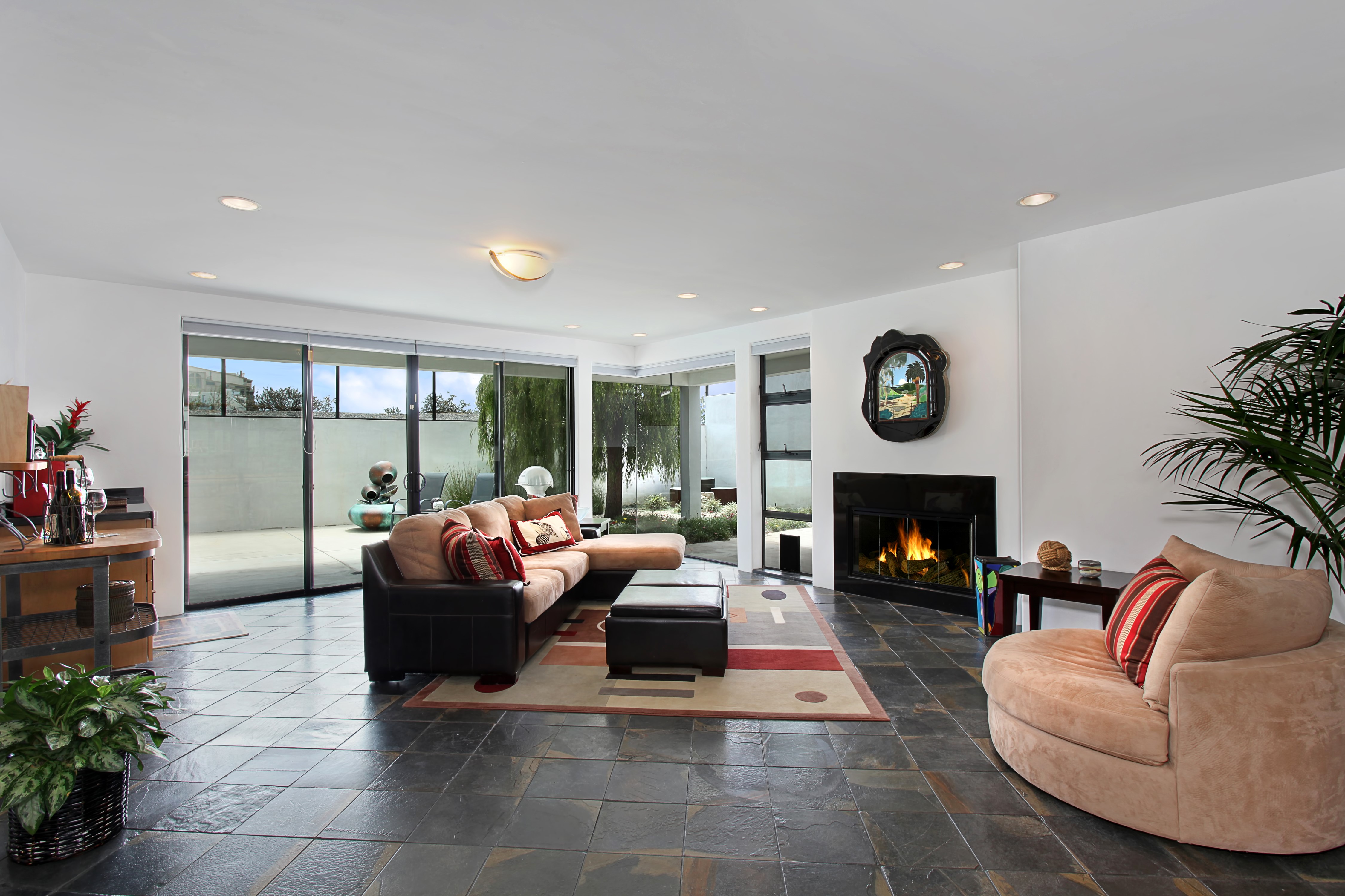 Living room with fireplace and sofa HD Wallpaper